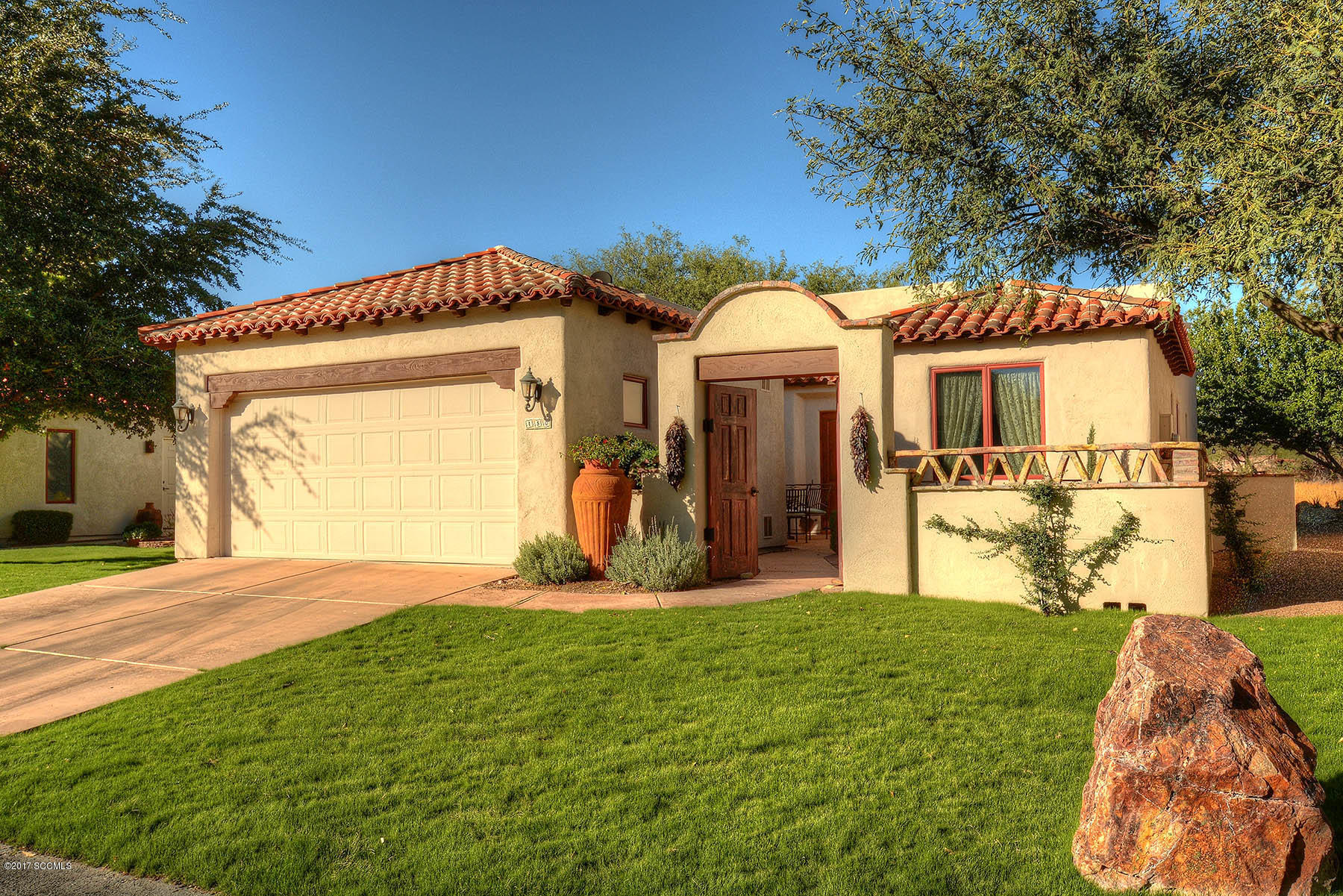 Beautiful rare Dorn Saint Francis model located on a quiet, low traffic street in Tubac Golf Resort. Behind No.7 Anza tee boxes, the home offers views and private Resort living at a affordable price. Gorgeous front wall, gate w/cement paver patio leads to the double entry doors. Large ''great room'' (entry foyer, living area and kitchen) make up the primary living areas. A beautiful gas fireplace and over sized Anderson sliding doors lead you to the fantastic rear patio (fully walled, paver hardscape and custom fountain). Kitchen area features granite counter tops, stainless appliances, and natural gas range & custom addition to afford more storage/work space for ''creative endeavors''! Den/office between the master & bedroom 2 (both w/full baths). Great rental or seasonal home!
