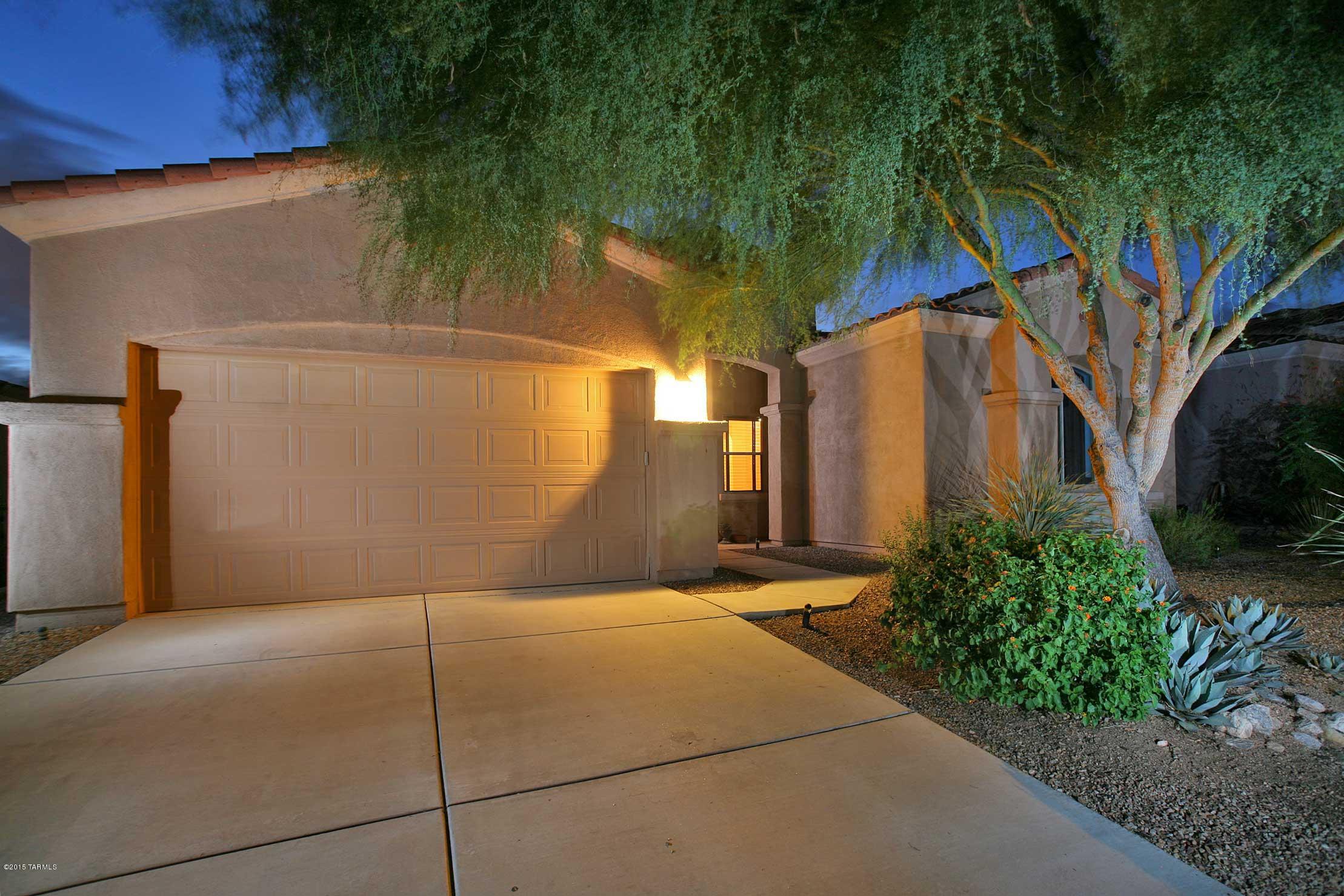 Lovely single family residence in the heart of the beautiful La Paloma. Within minutes of some of the finest shopping and restaurants in Tucson. This SFR totals 2200 sqft. Two bedroom and 2.5 bath featuring all upgraded stainless steel appliances, granite countertops, new carpeting and imported tile. Beautiful backyard was recently remodeled with entertaining in mind. Travertine Turkish tiles surround a wood burning fireplace and gas fire pit. Outdoor kitchen area with grill, sink and sandstone countertops. Master suite includes two walk in closets. Deep soaking tub, all granite dual faucets and a marble walk in shower. Spacious second bedroom with walk in closet and private full bathroom. Semi enclosed office looking out over a great room with 10 ft ceilings. Gas fireplace in living are ... with large bay windows. Excellent city and mountain views looking out over a protected desert landscape. Gated guarded community with pool and spa. This house is truly one of a kind in the rental marketplace. Located in the prestigious Catalina Foothills.  PLEASE CALL JEFF TO SHOW 5203607986
