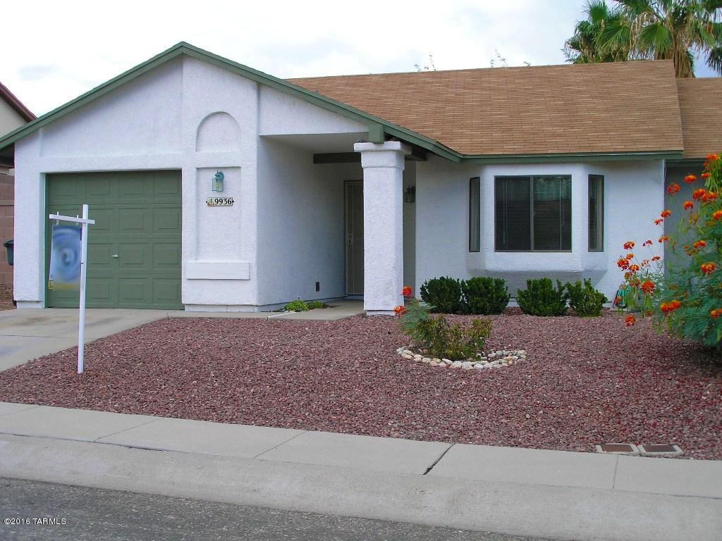 This is a Charmer of a townhouse for rent! This 2 bedroom/ 2 bath has newer carpet in living room and bedrooms. Vaulted Ceilings throughout, guest bedroom as bay window. Updated Master Bathroom with executive height vanity. Washer and Dryer included. 1 car garage with additional storage shelves. Covered patio & lovely fenced backyard with citrus trees & a pomegranate tree. North/South orientation. Has AC. All electric TH. Community has pool and spa with picnic areas. This is a must see townhouse. Fantastic East side location close to shopping (newer Walmart), Saguaro Nat. Park, scenic route, stable, hiking.  Must See Rental townhome! 12 month minimum lease term. Pet's require owner approval and additional deposit/fees. Proof of Renter's Insurance required at lease signing. Non-Smokers only