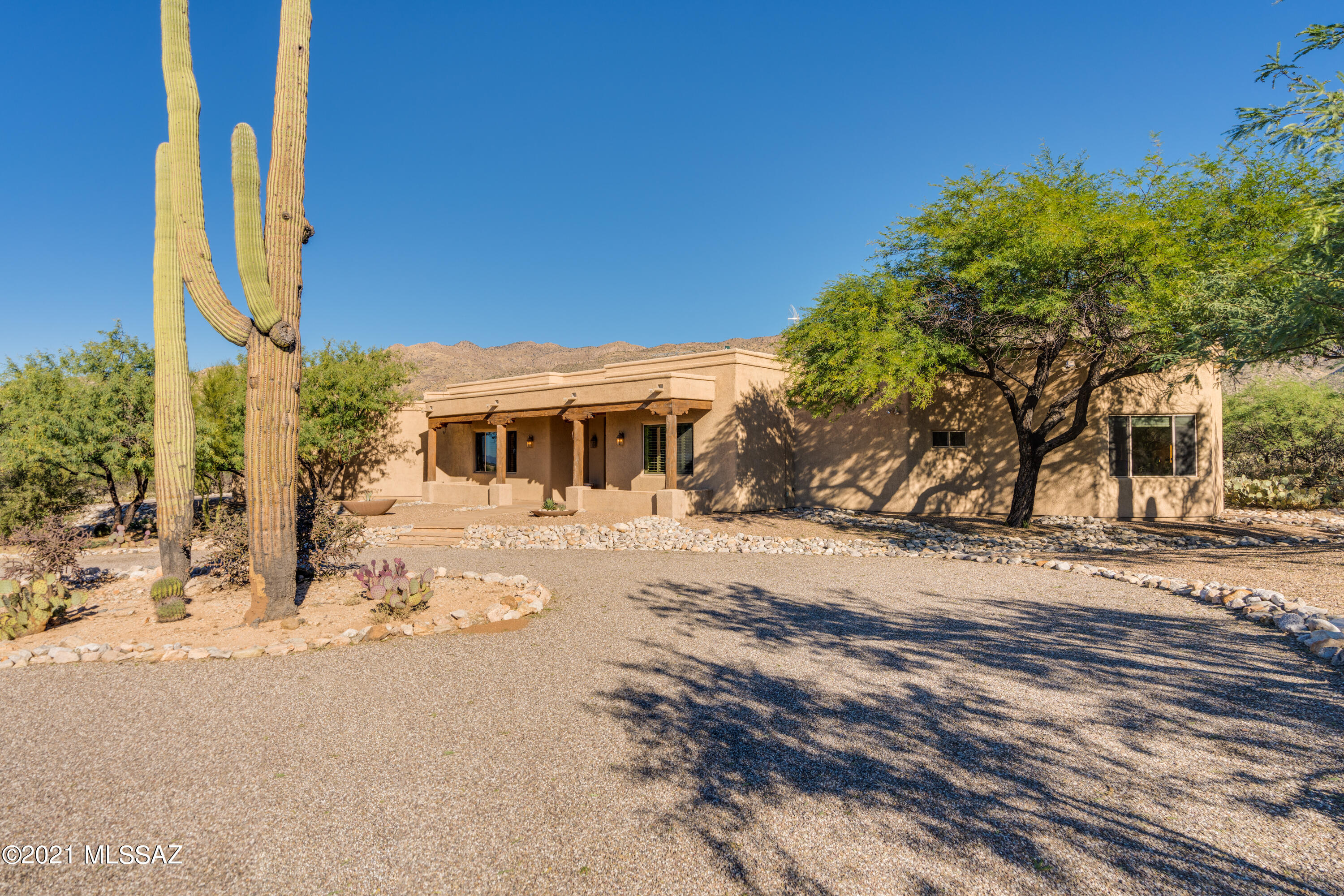 Desert retreat located Northeast of Agua Caliente Park. This is a low maintenance property and rare find on 3.35 acres. Original owner of this custom built home. Large living and dining room. North facing covered patio that runs the length of the home. Custom cabinetry in every room. Eat-in kitchen with large island. Convenient Laundry Room located next to Master. Master Suite with two walk-in closets & two vanities. 2-car garage with cabinets and workbenches.