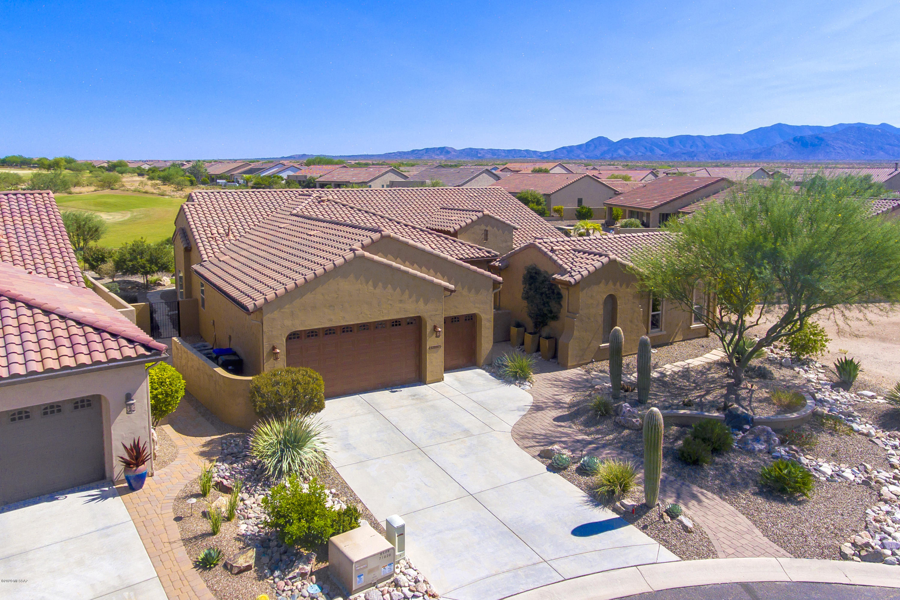 Fine living is yours in this spacious Brisa model with premier size casita. Walk into your enclosed private courtyard with inviting fireplace. Relax and enjoy the generous covered patio with a spacious pavered side patio ideal for spa, BBQ, or fire pit. Inside find a beautiful kitchen with premium cabinets & granite countertops, breakfast nook, dry valet bar, walk in pantry, & laundry w/full cabinets & utility sink. Elegant tray ceiling in foyer & great room which also has crown moulding & surround sound. Bay windows w/plantation shutters & large custom walk in closets in master & guest Bdrms, master bath with walk in shower, heated towel bar, soaking tub, side closet w/roll out shelves, full vanity powder room. Add to this the great amenities of this wonderful 55+ community. Why wait?