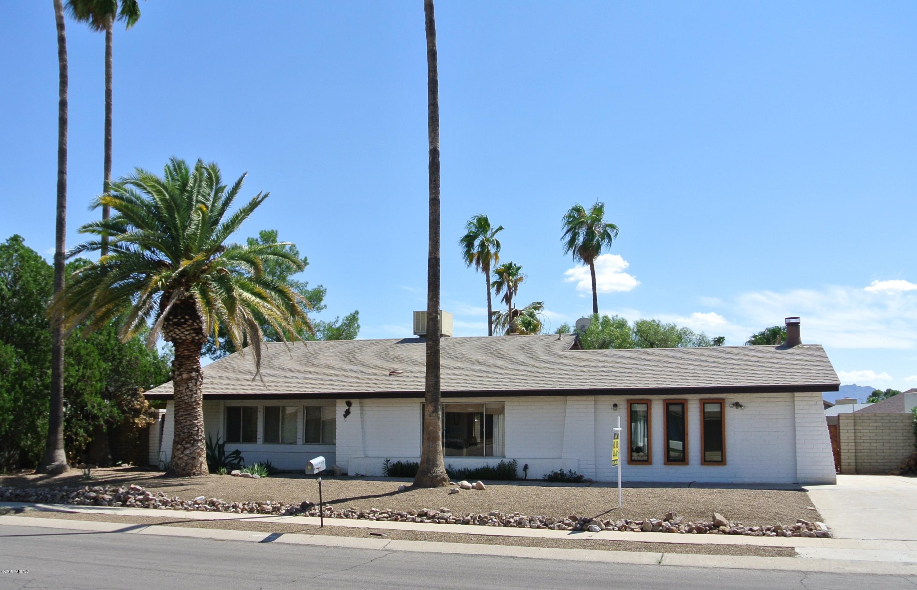 Cute 3 bedroom, 2 bath ranch style home has remodeled kitchen & bathrooms & slate tile. Large backyard with built in BBQ, built in planters, mature landscape, workshop & covered patio with brick pavers. Water harvesting system.