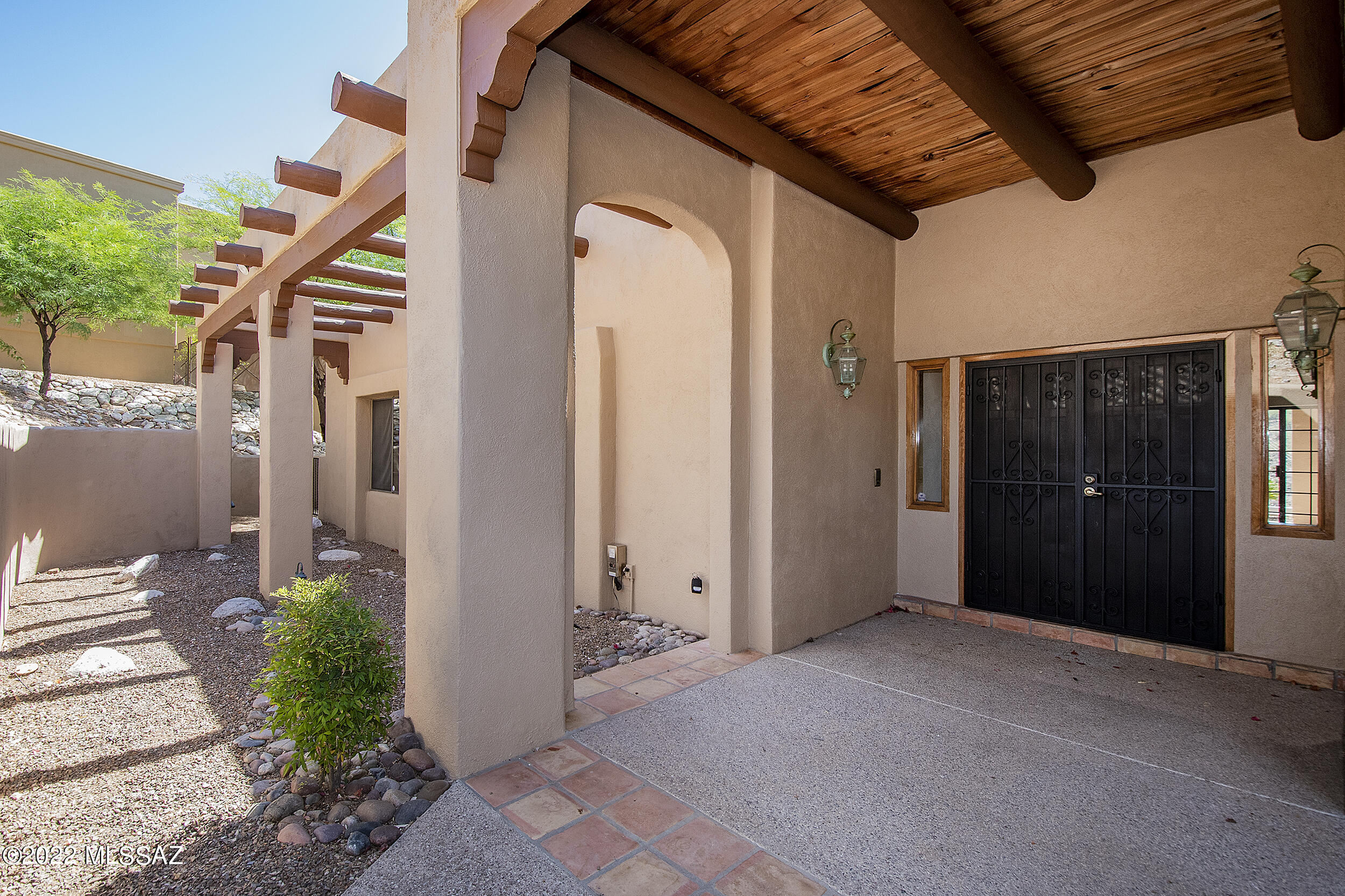 Range Price Listing. Seller will accept or counter offers within the range of $1,200,000 – $1,400,000. Private estate sitting on over 2 acres overlooking the valley. City and mountain views everywhere you look. This Catalina Foothills home is located in the gated Ventana Vista community of 13 private homes. The home boasts a living room, family room, formal dining area, laundry room, and walk-in pantry with attached cedar closet. Large master suite and master bath with walk-in closet, plus 2 bedrooms. Open kitchen off family room with breakfast area, light & bright with plenty of storage and counterspace. Large office area has built in book shelves and a fold-out work table. Covered patio overlooks the pool and spa, with views as far as you can see. It's the perfect spot for the evening barbecue. Nice 3 car garage and attached workshop round off the many wonderful things this home has to offer.

Be sure not to miss the wonderful guest quarters with its great views. Private entry guest quarters has a living room, bedroom, kitchenette with refrigerator, and a full bath. Superb for visitors or full-time living. Homes on this private street rarely come on the market. Close to great shopping and restaurants. Show and Sell Today. Thanks for showing.