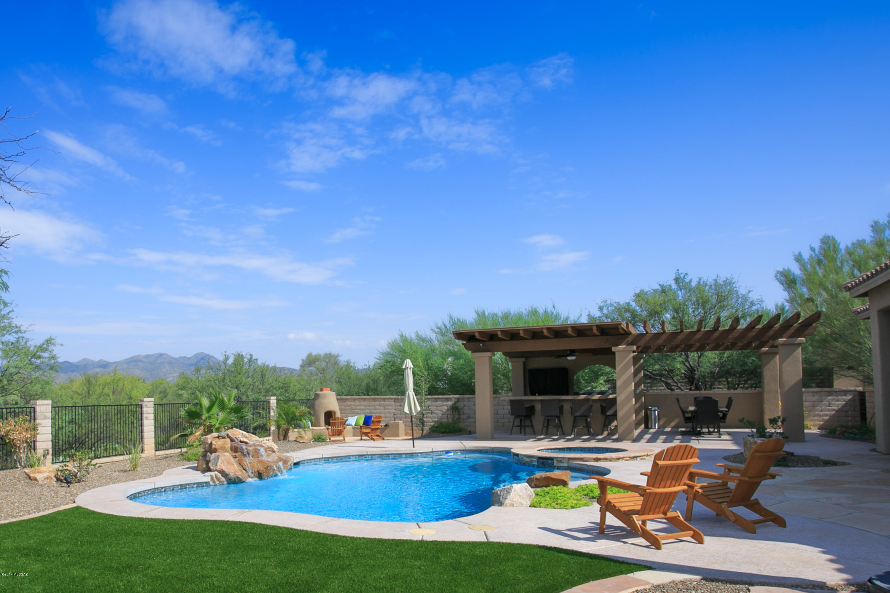 Incredible 4 Bedroom, 4 Bathroom Oro Valley Home For Rent In Gated Vistoso Gateway. Perfect For Entertaining - Kitchen Features High End Granite Counters, Dark Wood Soft-Close Cabinets, Whirlpool Gold Refrigerator, microwave and Oven, Electrolux Cooktop, And Bosch Dishwasher! Tile flooring Through All Main Living Areas, Carpet In Bedrooms & Wood In Bonus Room. Great Room Boasts Surround Sound System, Stone Faced Fireplace Formal Dining Room. Huge Laundry Room w/ Storage - Washer & Dryer Stay w/ The Home! Master w/ Private Patio, Ensuite w/ Huge Garden Soaking Tub, Separate Shower & Walk-In Closet! Almost An Acre Lot w/ Heated Pool, Hot Tub, Built in BBQ station, Outdoor Kitchen, Kiva Fireplace & Mountain Views In Both Front & Back Yards!! End Your Search! See This Home Today!
