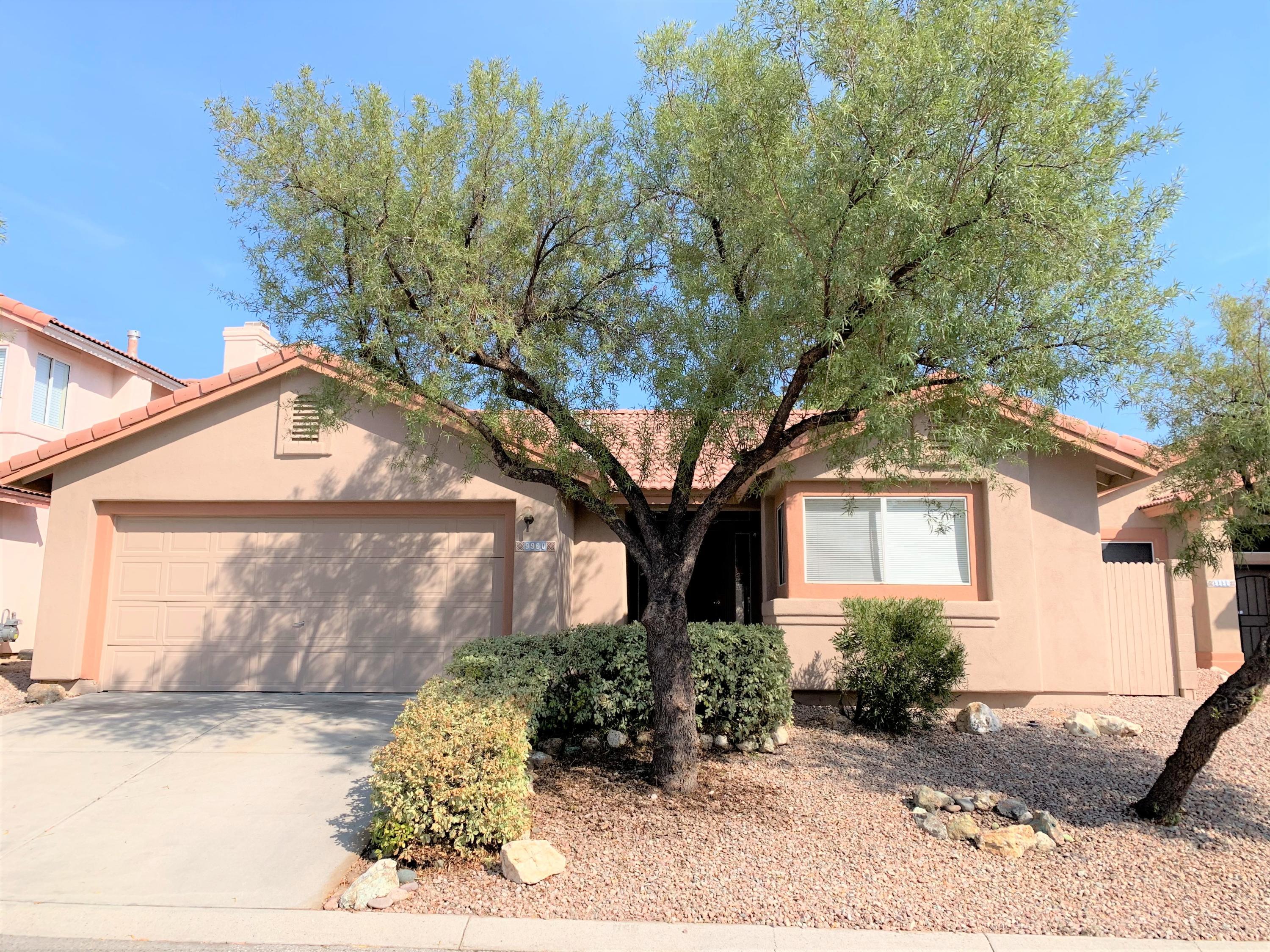 No Application Fees!  Very nice single level 3 bedroom, 2 bathroom North Tucson home located in North Ranch.   This community offers a community pool, spa, playground, sand volleyball and tennis court.    Open floorplan home with vaulted ceilings, tile flooring throughout and neutral paint throughout.   Kitchen features breakfast bar, separate pantry, gas range, dishwasher and refrigerator.   Master suite with walk-in closet, double sink vanity and shower.  Washing machine and dryer included.