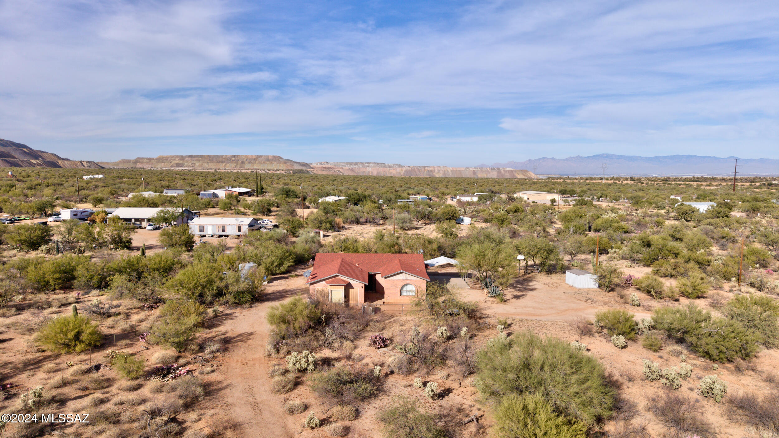 Imagine waking up to quiet mornings and stunning desert sunrises, with plenty of room to bring your vision to life. Want a guest house, workshop, RV garage, or a custom barn for your horses? There's plenty of space to bring your vision to life—and with an additional septic system already in place, you're one step closer to building that guest house, workshop, or anything else you have in mind! The home has all tile throughout and granite countertops with lots of counter space in the kitchen! And with Sahuarita's schools, shopping, and amenities just 10 minutes away—and quick access to I-19—you'll enjoy both privacy and convenience.