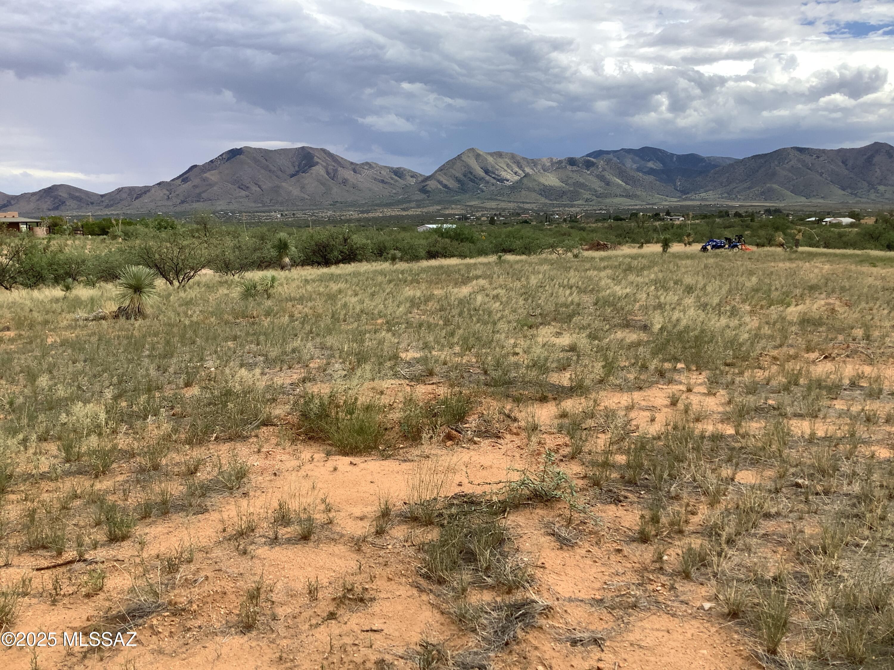 This newly divided property has beautiful 360-degree mountain view, small rolling hills, great spot to build your dream home.  New driveway was graded and culvert installed off of N. Johnson Rd side of property. This in a nice corner lot that has electric located at property line on E Little Wind Rd side of property and Dragoon Water available located on property on the north side of N Johnson Rd. This is a must-see property, and it is less than a 1/2 mile off blacktop.  Close to I-10 Exit 318 Dragoon and approximately 10 miles to AZ 191.