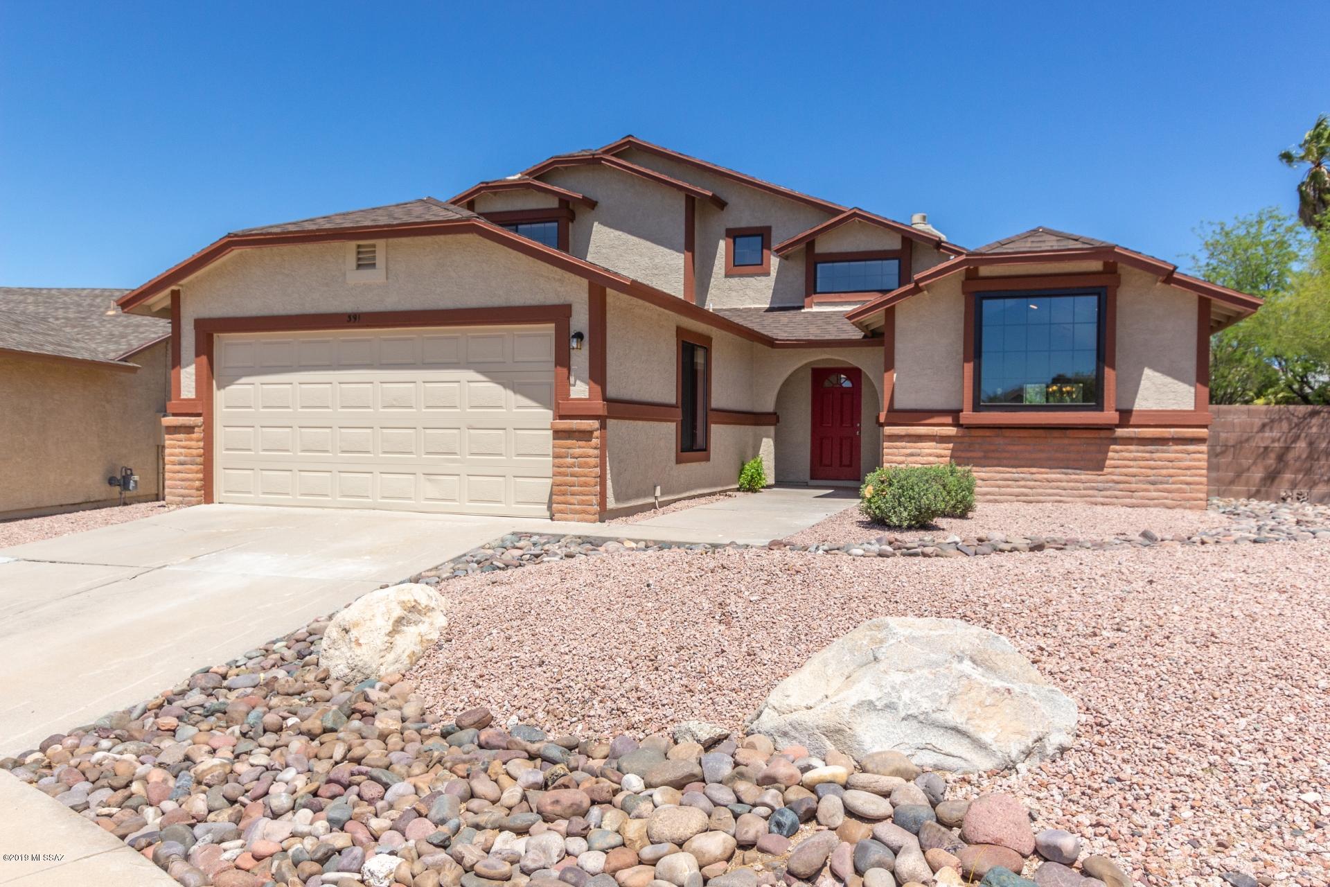 Welcome to a stunning newly remodeled contemporary style home with a new shingle roof! This home boasts new tile flooring and carpet throughout! Enjoy the wood burning fire places perfect for those cool desert nights! Entertain and create great meals in your stylish new kitchen, with stainless steel appliances and cool warm wood cabinetry, which add the finishing touch! Enjoy three spacious bedrooms and two bathrooms, and an upstairs loft perfect for an office! This beautiful, clean and simple palette will embrace your furnishings from the start! Step outside and enjoy your low maintenance yard and private pool perfect for those HOT summer days!!! Create your own oasis in your huge yard perfect for grilling and pets!