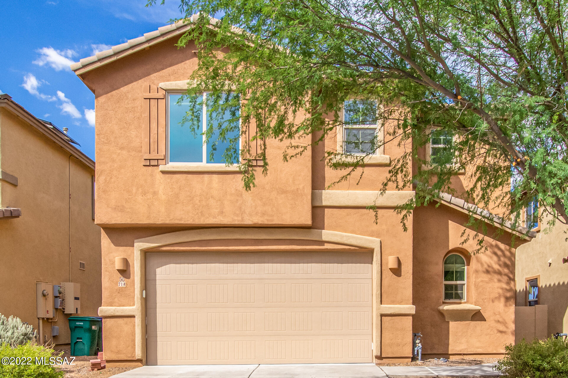 Gorgeous and well maintained two story home in Rancho Sahuarita updated with new carpet throughout the home and fresh interior paint.This 3 bed/ 2.5 bath home features an open floor plan, gourmet kitchen with granite countertops, center island, double ovens  and stainless steel appliances. The upstairs includes a great size multi-purpose loft that can be used as an additional family room, playroom or office room. Step outside to your desert oasis backyard with a covered patio and decorative rock which provides with low care maintenance so you can have all the time to host your guests and family.  Relax and enjoy the community pools, visit the lake, recreation center and water park + more amazing amenities. This is a beautiful place to call home!