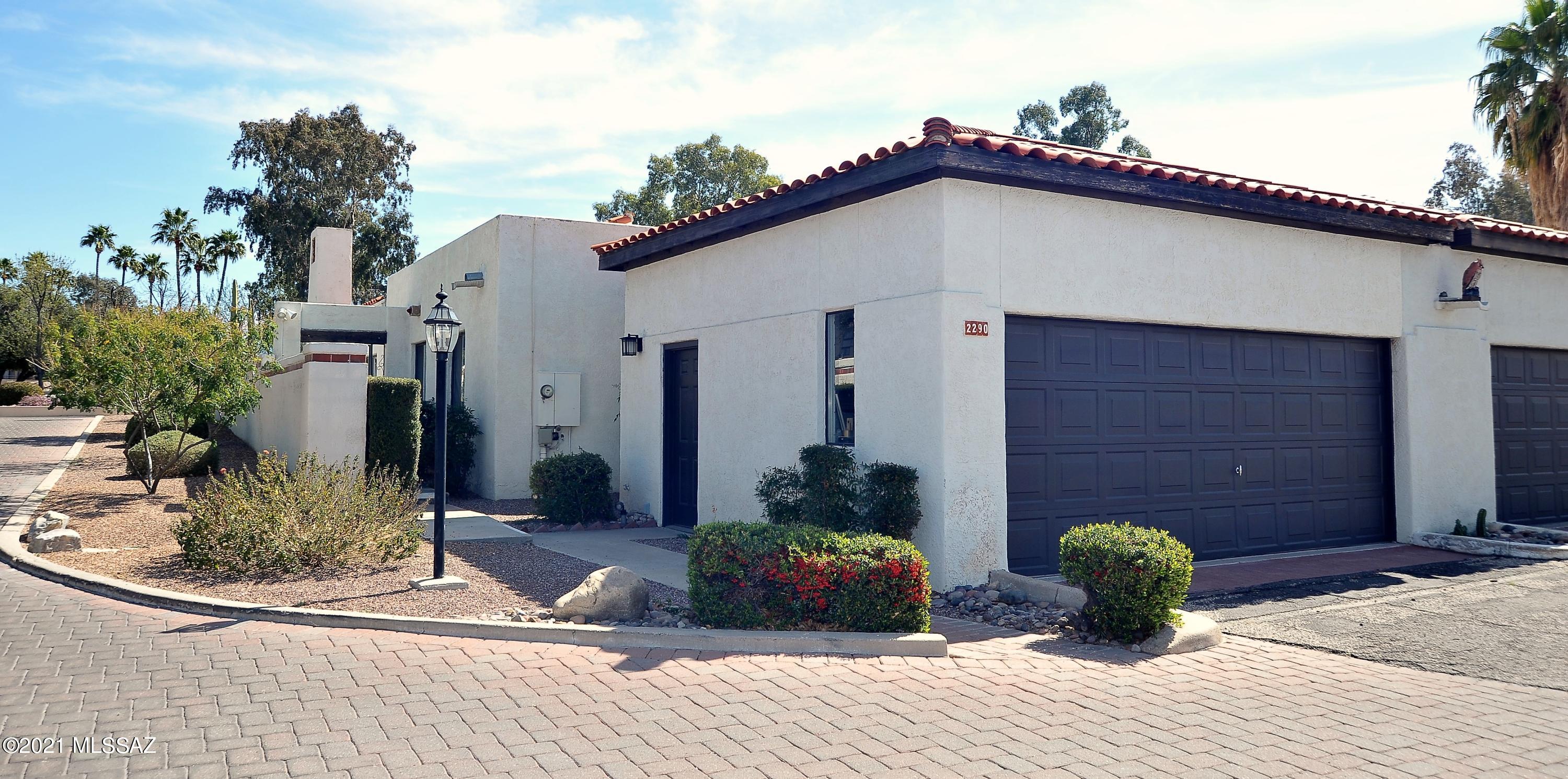 Charming 3BR/2BA townhouse in Northeast Tucson! This turn-key home features a Beautiful open floorplan, Light and bright throughout, Tall Vaulted Ceilings, Gorgeous Dining room Chandelier, Arizona Room, Cozy Fireplace in the living room, Meticulously maintained and adjacent to Udall Park, close to hiking trails and tucked away in a quiet community. This home has it all! Schedule a showing today!