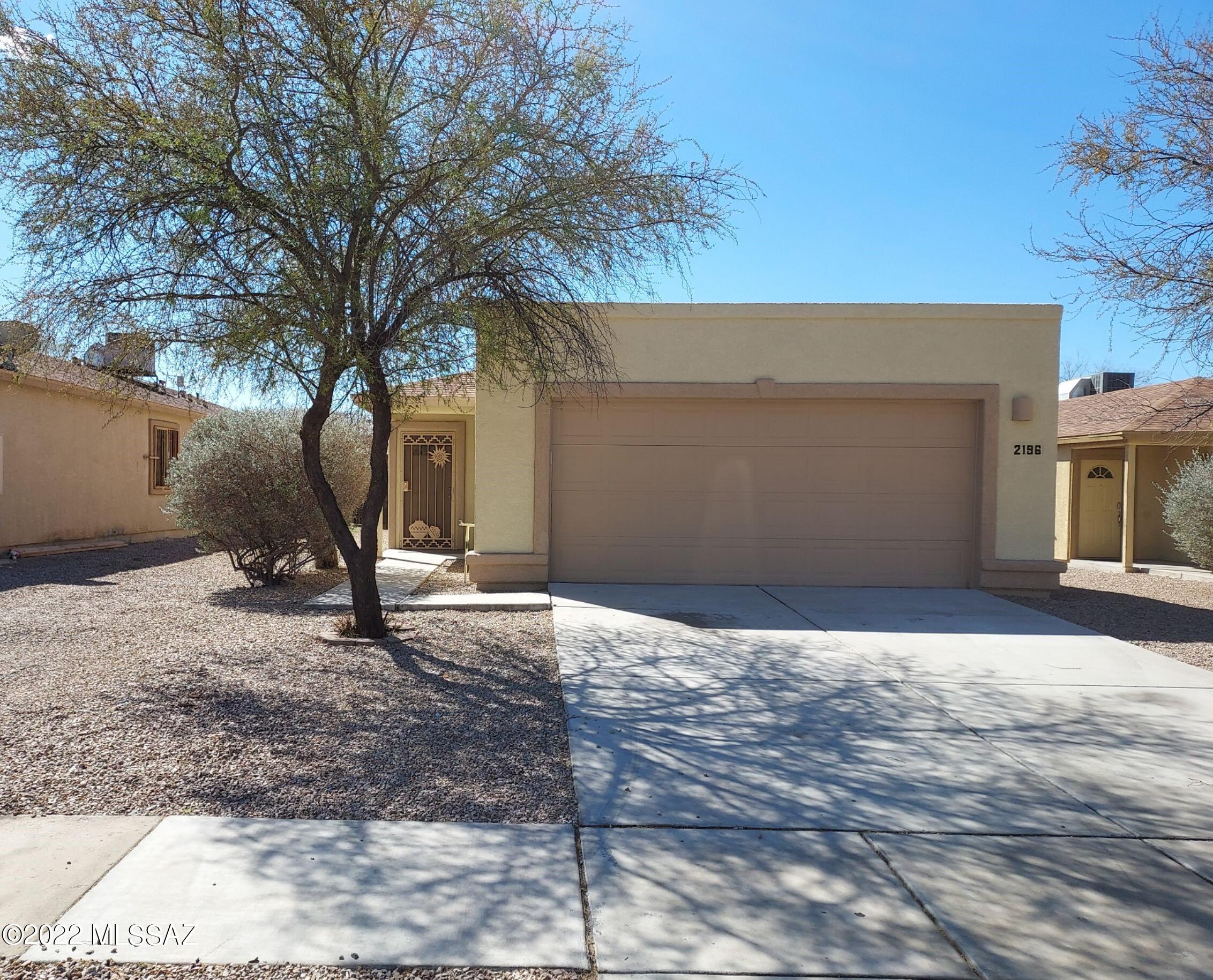 This is a well maintained single family residence that is conveniently located near many stores and restaurants.  This home has been newly painted inside and out.  High ceilings in the kitchen, dining area and living room.  New granite countertops have been installed in the kitchen and hallway bath.  New carpet has been installed in the bedrooms. The ceiling fans in all three bedrooms and in the large living/dining area add comfort and cooling.  The spacious attached 2 car garage is another plus.  This could be a great starter home or a possible rental property.