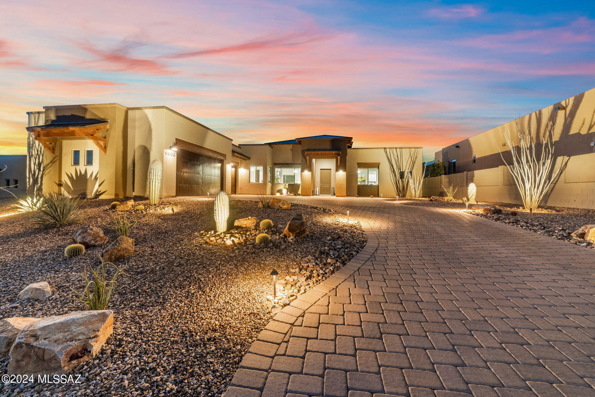 Escape to unparalleled luxury with this extraordinary residence nestled in gated Boulder Bridge Pass At Dove Mountain. This exquisite 3 bedroom + Office, 3.5 bath home offers breathtaking mountain views and lush golf course as your serene backdrop. Step into a world of refined elegance as you explore the spacious 2,792 sq. ft. interior of this property which is selling Furnished. With meticulous attention to detail and impeccable craftsmanship throughout, every aspect of this home exudes sophistication. The outdoor oasis beckons with a sparkling pool & spa. The backyard is a golfer's paradise, complete with putting green. Enjoy world-class golfing right in your own back yard which is on the first hole off the green on the Saguaro nine at the Golf Course at Dove Mountain.