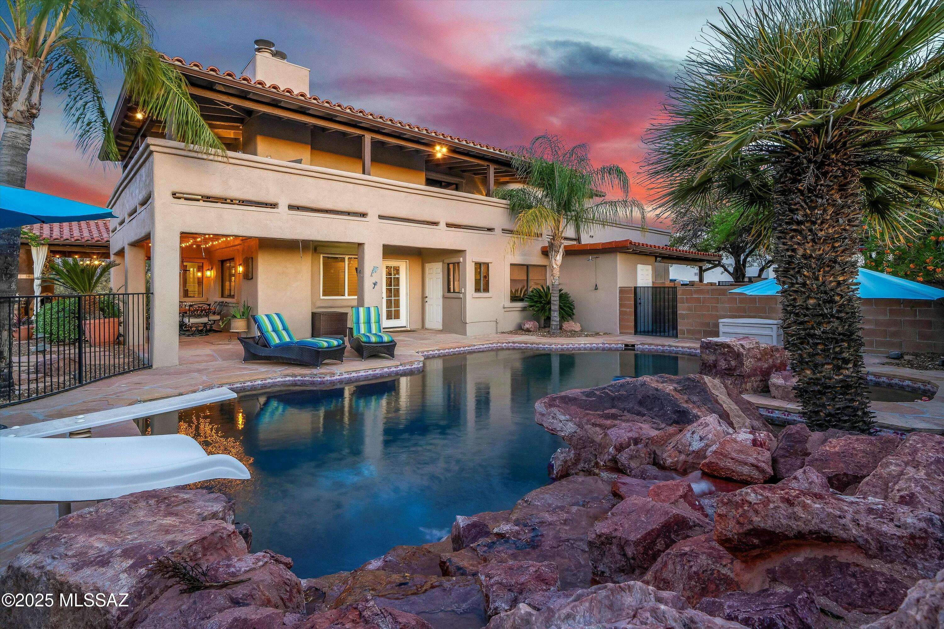 Welcome to your dream desert oasis! Nestled in a serene Tucson neighborhood, this stunning 4-bedroom, 3-bath home perfectly blends Southwestern charm with modern comfort. Step inside to soaring ceilings, abundant natural light, and an open-concept floor plan designed for both relaxation and entertaining.
The spacious kitchen boasts granite countertops, stainless steel appliances, and a large island - ideal for gathering with family and friends. The primary suite is a private retreat featuring a spa-like en suite bath & 2 walk-in closets. Three additional bedrooms offer flexibility for guests, a home office, or a growing family.
Outside, your personal paradise awaits. Enjoy breathtaking mountain views, a sparkling pool, lush landscaping, and multiple seating areas perfect for Arizona... sunsets and stargazing. With thoughtful upgrades throughout, this home offers tranquility, space, and style all in one.
Don't miss your chance to own this slice of Tucson heaven!