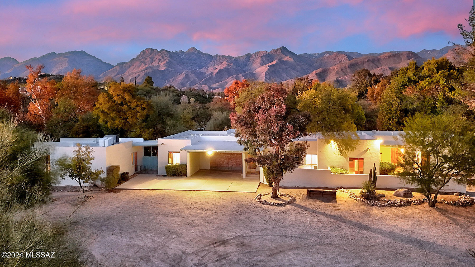 Formerly ''The Estate and Home of Bazy Tankersley'', Tucson's premier Arabian Horse breeder and newspaper publisher, daughter of US Senator Joseph McCormick and US Representative Ruth McCormick.  Founder of Al-Marah Arabians in Tucson, her 10.75 acre home and compound bordered Al-Marah, allowing her quick access to her beloved horses.  Bounded on either side by branches of Sabino Creek with forests of cottonwood, sycamore and mesquite trees, offered are the 5-bedroom 5 ½-bath Main House with 4,740 sq. ft., the 876 sq. ft. 1-bedroom Casita and the 2,662 sq. ft. Event/Party House.  Browse the 20' x 32' library/living room in the Main House with a soaring beamed & planked ceiling, a corner fireplace, hand-painted clerestory windows & doors (possibly painted by Helen Murphy) and, walls of built-in bookcases.  House friends or family in the Guest House with kitchen, bedroom and living room.  And entertain guests in the hacienda-like Event/Party house featuring a gourmet kitchen & butler's kitchen, professional gas range, separate breakfast room, glorious 17' x 30' dining room with rows of beams & corbels, a beehive fireplace, a historic chandelier, niches, and scored concrete floors.  Meet or entertain in the 29' x 19' main room with a fireplace and lounge, or grow orchids in the 29' x 17' solarium.  Mexican light fixtures, hand-carved doors, decorative iron door handles, and wrought-iron banister to the upstairs viewing deck.  An abundance of high desert flora and fauna, private well, swimming pool, tie your horse to the hitching posts in front of the Main House and live a private, secluded life in one of Tucson's lushest locales.