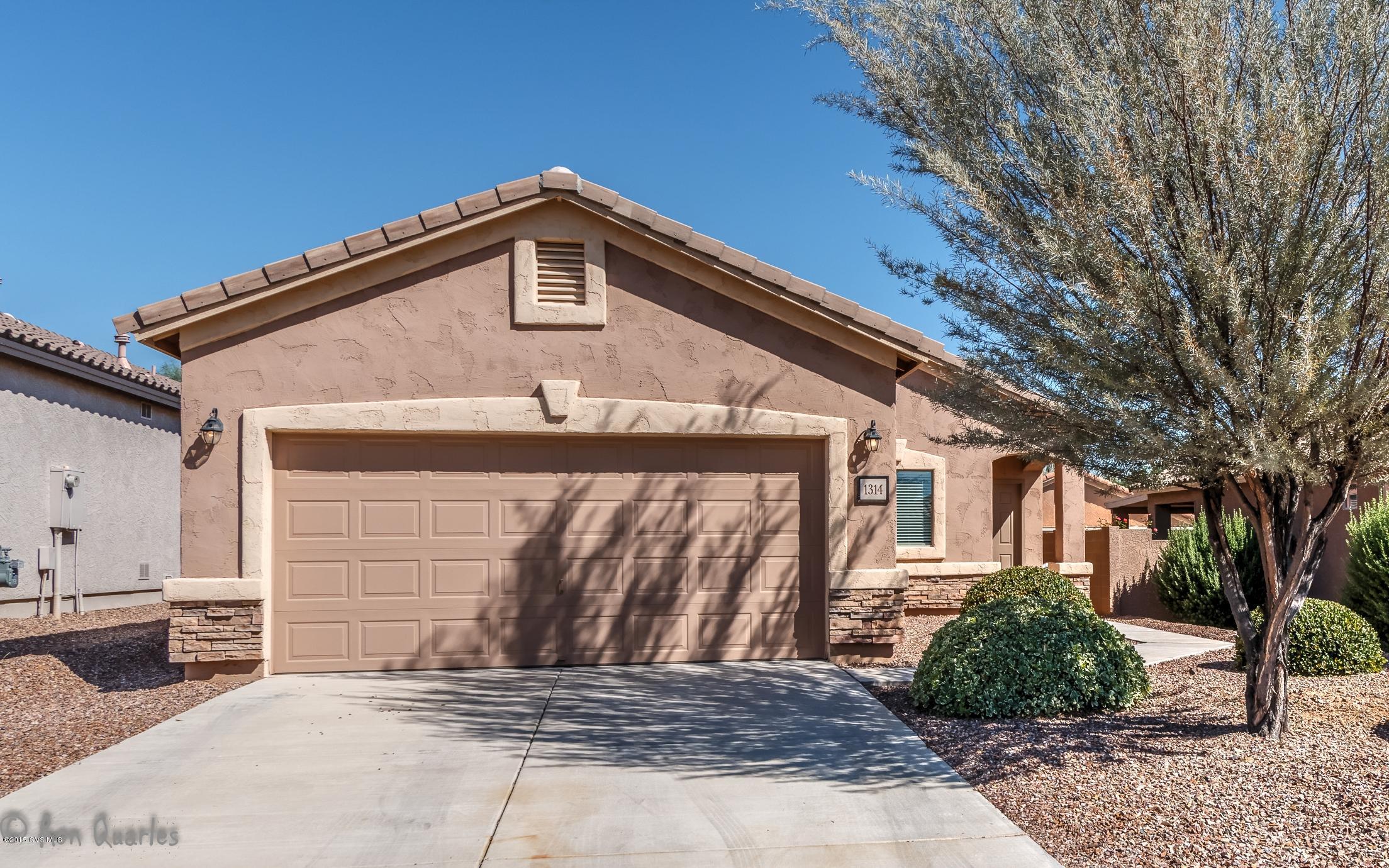 Live the resort lifestyle! Beautiful home in Rancho Resort is ready for it's new owners. Open concept and good use of space with 2 bedrooms,2 baths,plus a den.All appliances are included and home is move-in ready.Extended covered patio and good size backyard is fully fenced and very private.4ft. extension on the garage to fit longer vehicles. Award-winning 55+ community has a wide variety of activities, clubs and events. Enjoy the sparkling pool, stunning clubhouse, tennis, volleyball, putting green and more. Located 20 minutes South of Tucson and only 5 minutes from Sahuarita shopping and restaurants.