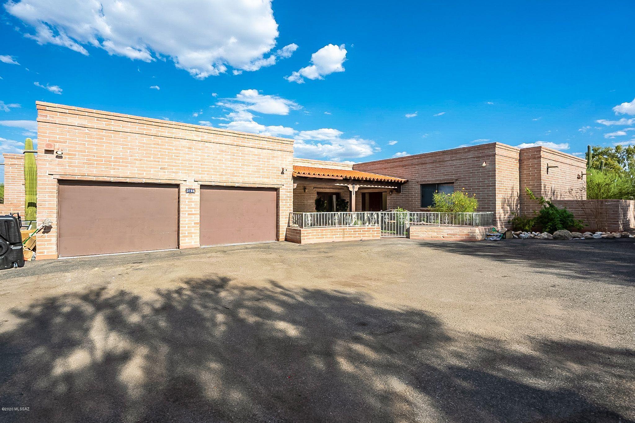 Gorgeous home in an exclusive Catalina Foothills gated community. Located in the center of a cul-de-sac with large lot on top of a hill with views of the Catalina mountains, city and gorgeous Tucson sunrises and sunsets. Home borders a large wash for both privacy and unobstructed views. Move-in ready or customize this incredible home to make it uniquely yours. Schedule a showing today!