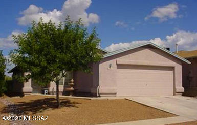 Spectacular views from the brick patio of this immaculate 3BD/2Bath SE area home. NO Neighbor to the rear gives unobstructed views and privacy! Vaulted Ceilings, tile floors throughout living areas, bedrooms are carpeted. Home features ceiling fans and has central AC. Good storage in the garage, extra outlets, garage storage units stay. Built in book case in master bedroom. Covered Patio with great mountain views, ready for entertaining and BBQ's.