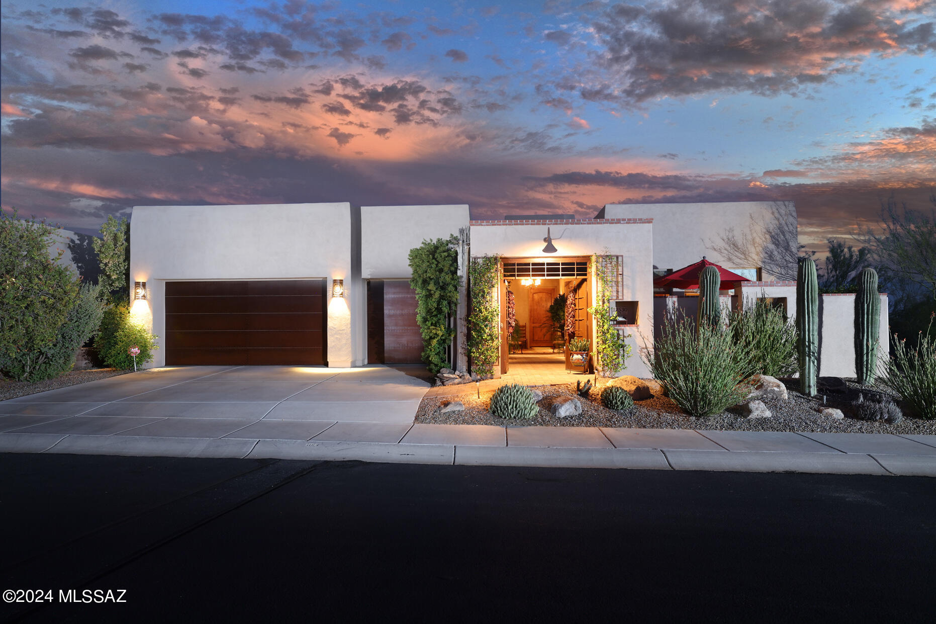 Beautiful ''Insight'' custom-built Eagle Floor Plan Home on one of the best Private & Premium Lots. Courtyard entry w/brick pavers & Stone Cactus Waterfall. Great Rm w/15' Viga Log Beam ceiling & Family Rm w/10' ceilings, Den, 3 baths w/granite & 36'' high vanities. Master BR & bath w/steeping bathtub & huge custom-built closet. Scored concrete floors & Low E windows, security system, fire suppression sprinkler system in home/garage/patios. Central Vac, Wtr Softener, 2 A/C w/3 Zones. Gourmet Kitchen w/GE Monogram SS & Bosch appliances w/new 42'' built-in refrigerator, Peninsula Island w/built-in wine ref., granite & cabinets. Butler Pantry w/granite, glass cabs & food pantry. Built-in Gas Grill, Kiva FP, view fence, Citrus Trees. Roof re-coated & home painted. See Supplement. Beautiful Insight custom-built Eagle Floor Plan Home on one of the best Private and Premium Lots in The Preserves. This home has 180 degrees of Mountain Views from every window; encompassing Mt. Lemmon, Pusch Ridge, Mt. Wrightson, Tucson Mountains, Sombrero Peak and Kitt Peak! Magnificent Sunrise and Sunset views with aces of open space on the East, Southeast and Southwest sides of the home. 

Welcome to your tour at the highly desirable gated community, The Preserves III. Located in the Dove Mountain Community which has over 6,200 acres in the Foothills of the Tortolita Mountains and there are over 30 miles of scenic hiking trails in the Tortolita Mountains. This home is across the street from The Preserves Hiking Trail System as well. It is within 5 minutes from The Ritz Carlton Resort and Gallery Golf Club where there are 3 award-winning golf courses on Dove Mountain. 

Enter the home from a very private extended walled front Courtyard with mature landscaping, brick pavers and a Stone Cactus Waterfall. The custom 42" Knotty Alder front door opens up to the Great Room with 15' high Viga Log Beam ceiling. In fact, all interior doors are 8' Knotty Alder with Oil Rubbed Bronze Hardware. The 3,371 sq ft home has ceiling fans in every room as well as custom chandeliers throughout. The Family Room has 10' ceilings with a Beehive Fireplace w/tile surround. The Den is currently used as a Theater Room. The home is equipped with built-in speakers in the Great Room, Family Room and Back Patio. All 3 baths in the home have granite counter tops, 36" high vanities, framed mirrors and wall sconces. There are 2 snail showers with mosaic tiled walls and tumbled marbled floors. The master bath includes a large steeping bathtub along with a huge custom-built closet. The home has finished scored concrete floors throughout and Low E windows; all with Hunter Douglass Woven Wood Shades. The home Office includes a built-in desk with file drawers and upper bookcases. 

The home also includes a Security System, Fire Suppression Sprinkler System throughout the entire home as well as the Garage and front/rear Patios. There's also Central Vacuuming, Water Softener, 2 A/C units with 3 zones and all walls are insulated for sound. The 3-car Garage has a 2' extension, storage racks, cabinets and work bench area. The roof has been re-coated and the house was recently painted. The Refrigerator, Water Softener, Water Heater, Dishwasher, Washing Machine and outdoor Gas Grill have all been replaced in the previous 2 years. 

The Gourmet Kitchen has all GE Monogram and Bosch Stainless Steel Appliances with a brand new 42" built-in refrigerator, extra kitchen cabinets with under cabinet lighting. The peninsula island has a built-in wine refrigerator, granite countertop and extra cabinets. The adjacent Butler's Pantry includes granite countertop, glass cabinets and a food pantry cabinet. 

Step outside and enjoy your private backyard oasis with built-in Gas Grille with granite countertop, Kiva Wood-burning fireplace, brick pavers, view fence, outdoor dining area, T&G rear patio ceiling with speakers, decorative wood beams, Stone Cactus Waterfall, Wrought Iron Plant Trellises, custom rusted window awnings, mature Meyer Lemon and Pink Grapefruit Citrus trees and, of course, spectacular mountain views.