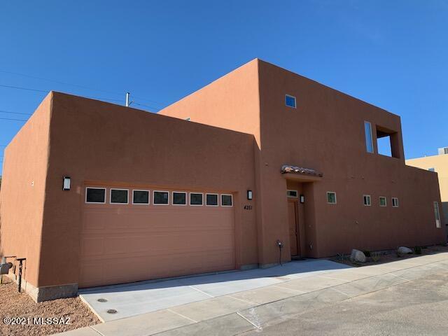Stunning Mountain Views await you in this Beautiful Brand New 2 story Home in the Sabino Shadows Community! The spacious downstairs owner's suite includes a large bathroom with separate vanities, granite counter tops, large tiled walk-in shower, and a walk in closet conveniently equipped with a stacked washer and dryer. The Galley kitchen has plenty of cabinet and storage space and includes granite counter tops and SS appliances. Dining area with wine bar includes sink and mini-fridge. The 2 upstairs guest suites each have access to outdoor covered balcony. They also share a bathroom with walk in shower, and laundry closet with a stacked washer/dryer. 2 car garage with extended ceiling height. Enjoy outdoor covered patio with beautiful brick pavers. This Gorgeous home won't last long!