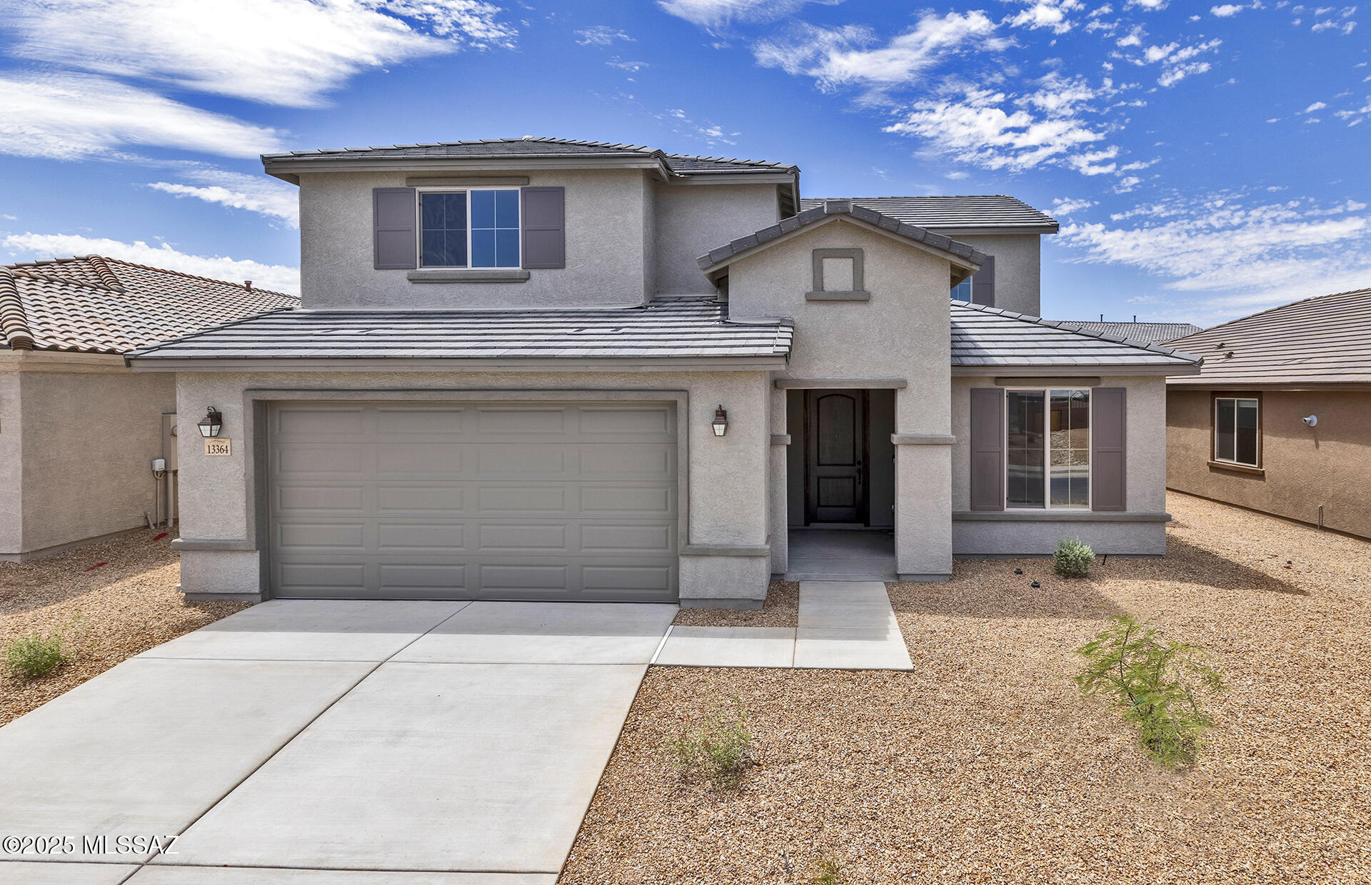 Move-in ready Prato floorplan featuring 5 bedrooms and 4.5 baths. The home showcases coastal shaker grey cabinets and Snowridge granite countertops in both the kitchen and owner's bath. Elegant design touches include a tray ceiling in the foyer, 8' interior doors, mission-style stair rails, and two-tone ''First Star'' paint. Additional highlights include upgraded electrical throughout, a radiant barrier for energy efficiency, and a variety of designer-selected finishes.