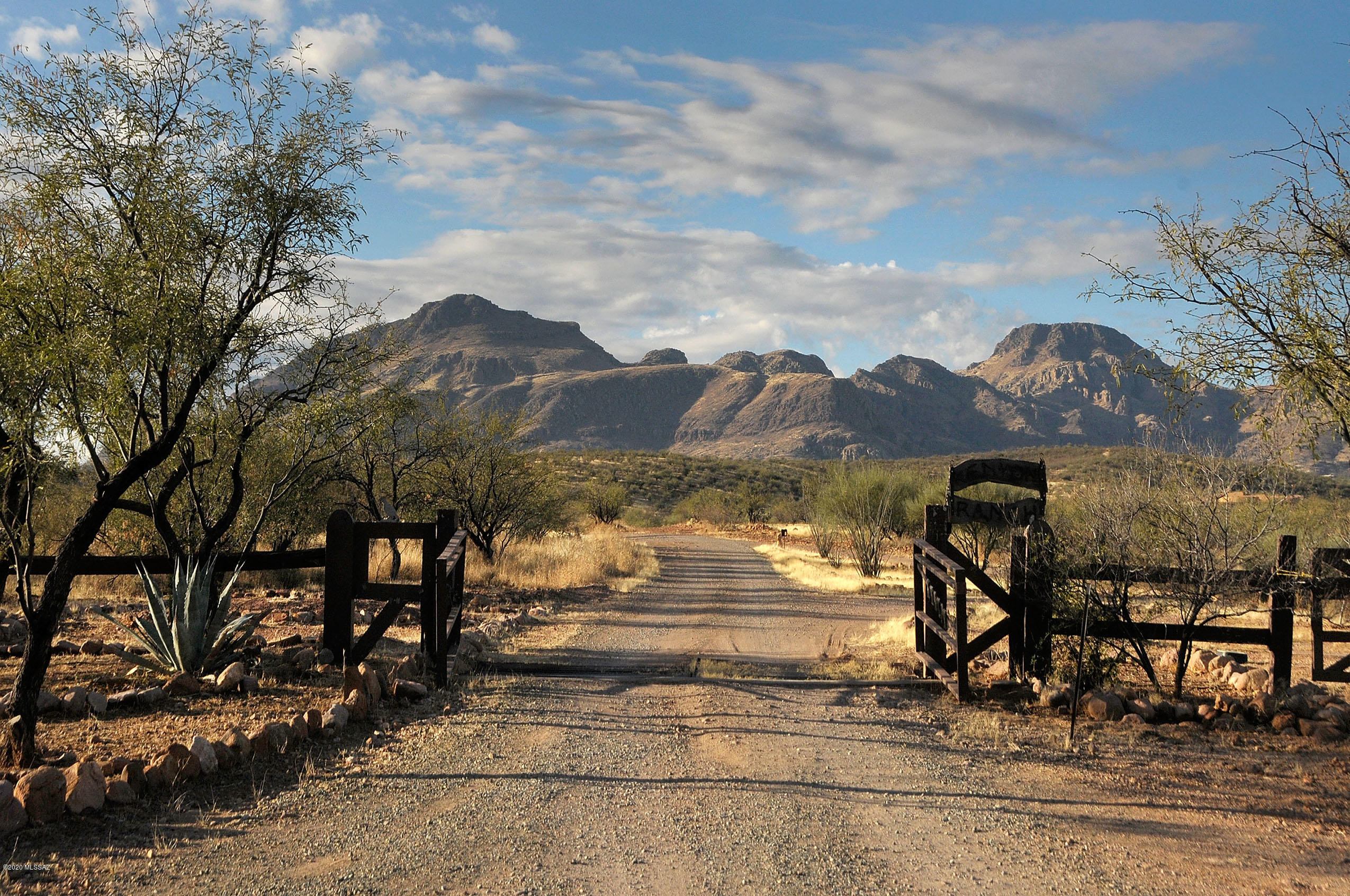 For almost 85 years the Kenyon Ranch has been one of the most important historical properties in Tubac. Started in 1936 as a dude ranch, the 75+ acre ranch recently operated as a retreat facility. The property consist of a 4399 sq ft main house with commercial kitchen and  large dining room, 17 guest casitas and 4 stand alone homes on the west side of property. The 2000 sq ft lodge is suitable for group events up to 100 people.
All furniture, fixtures and equipment to run facility included in sale.
Three private wells, pool and hot tub, horse facility, round pen and tack room. Additionally, there are several massage rooms and a sweat lodge. Wonderful panoramic views and amazing sunsets . 
Schedule your appointment to see this unique property.