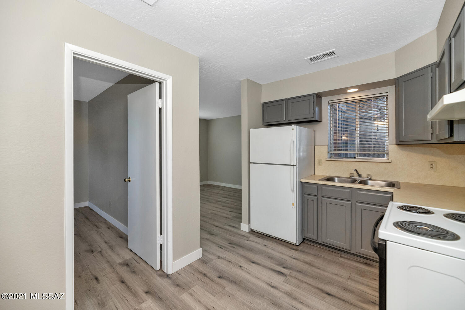 Obtain a 6 unit property that has been redone. Large Storage rooms for additional Income along w/Owner Owned Coin-Op Laundry. The ample parking lot has been recoated w/new striping. The Exterior newly painted w/MODERN paint. The interior has been painted along w/ 4 inch baseboards and all outlets have been replaced.Fully occupied at $895 per door. There is a Gazebo with a new Picnic area for the Tenants. All Exterior Doors have been refinished. New Thresholds in every unit. Solar Security Lighting has been added as well as Exterior Security Doors. New Doors on all of the Water Heater Closets. ALL new sunscreens added. The interior have all new laminate wood grain flooring with padding. New ceiling fan and much more-see the document tab-Buyer to verify all facts & figures.