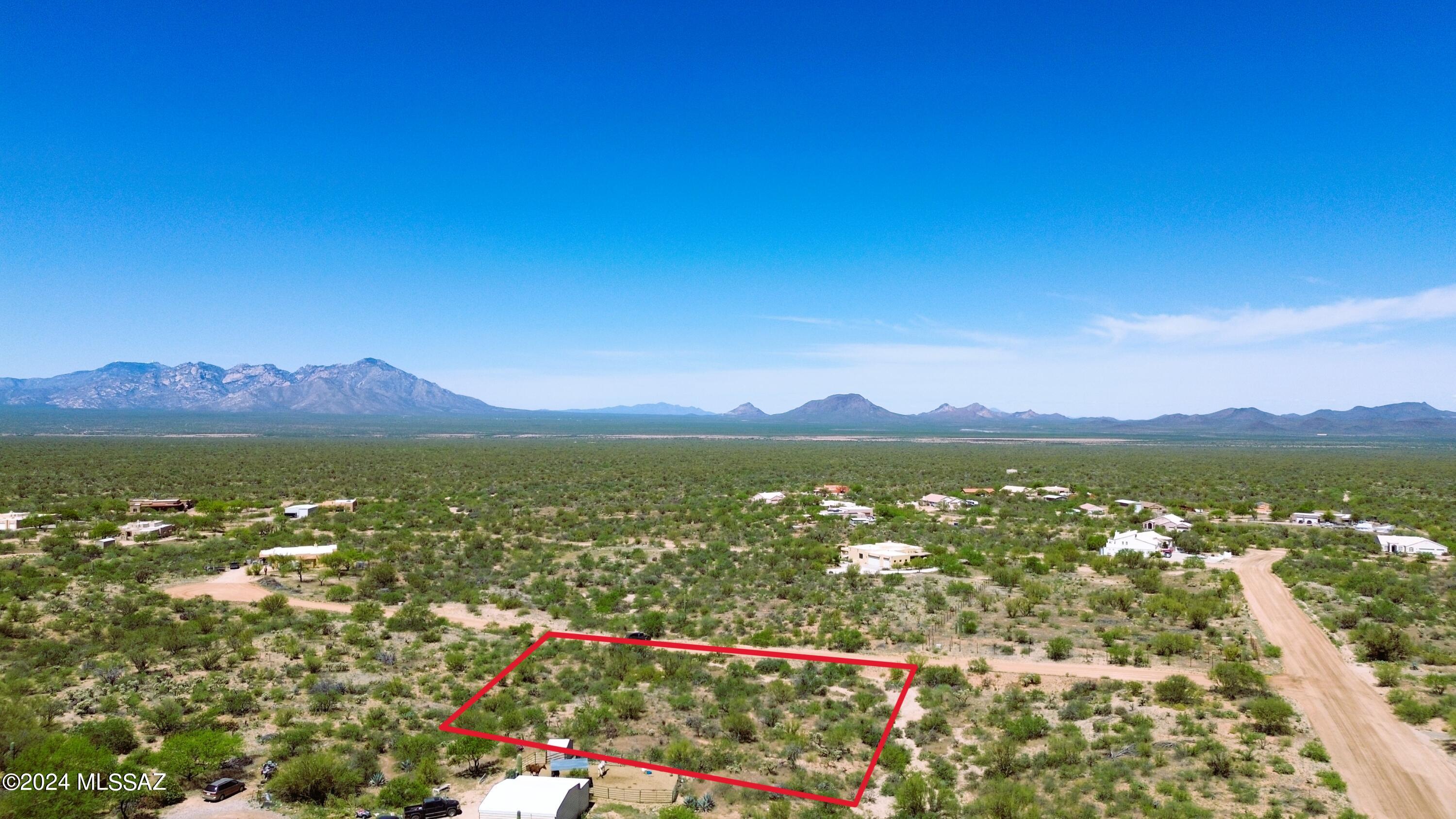 Lot 257 in Diamond Bell Ranch unit 9 for sale !! Discover the hidden gem of Diamond Bell Ranch, where Tucson's charm meets Southern Arizona's allure. Embrace breathtaking vistas of Kitt Peak and the Baboquivari Mountains. Here lies your canvas to craft your dream abode, atop this premium large 1-acre lot. With utilities conveniently at the lot line and no HOA restrictions, the stage is set for your vision to unfold. Benefit from nearby underground utilities.  County-maintained roads ensure accessibility. Amidst a neighborhood adorned with custom homes, pride of ownership radiates, with the freedom to accommodate horses. Don't miss the opportunity to seize this easily buildable lot, where space for both your home and cherished animals awaits. Take the first step towards making your dream a reality - come experience the allure of Diamond Bell Ranch today!

Important Note: Buyer to verify ALL specifics on the subject property.  Including but not limited to, zoning, floodplain, topography, hydrology, legal and physical access, and utilities. Buyer to verify the intended use with zoning.  Buyer to verify utility locations, costs, and accessibility. All details provided are for reference only. Please independently verify all information. Any markings or flags on photos and maps are approximate and not professional survey lines. Ask Broker for a list of certified professional engineers and planners to help in this due diligence verification.