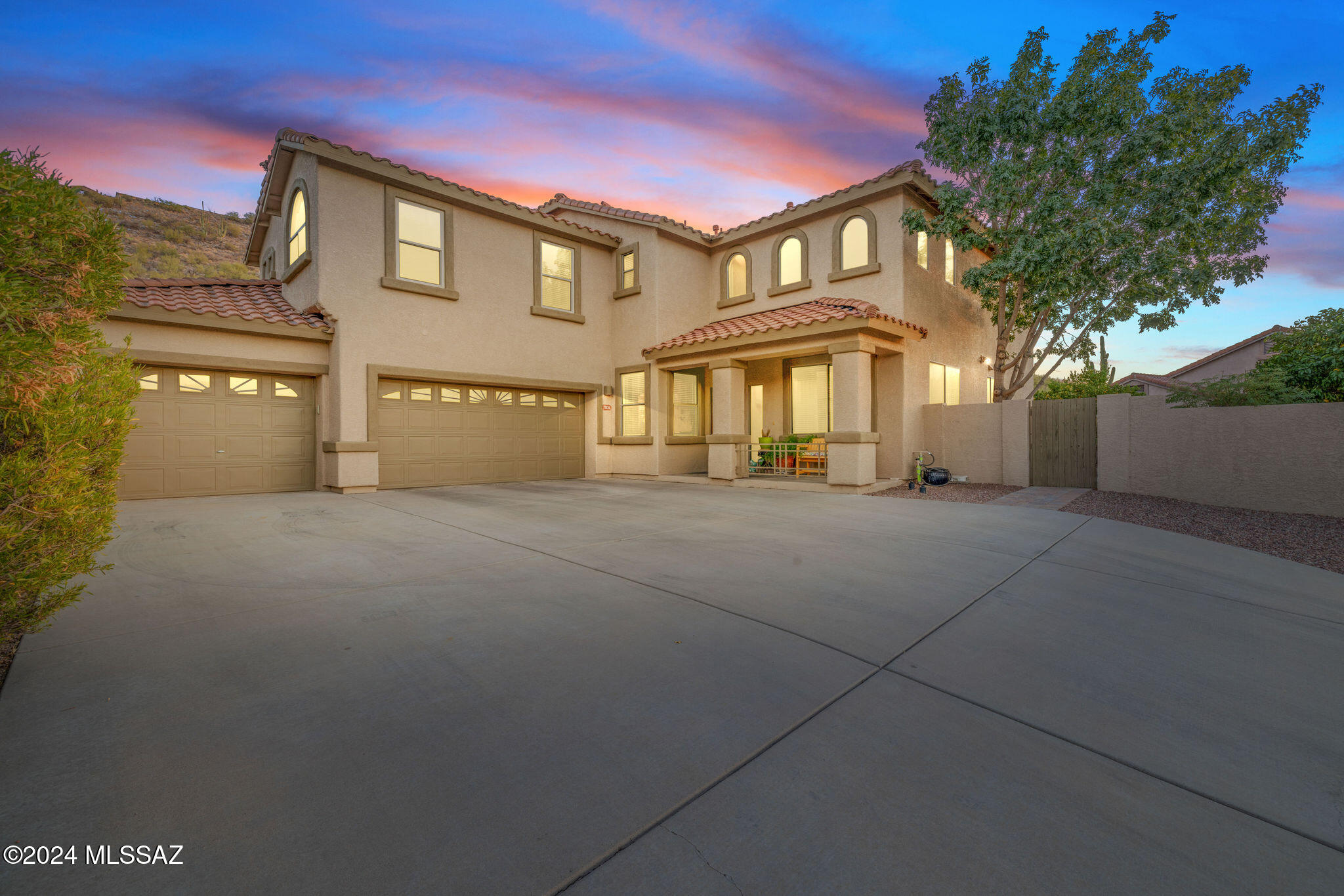 Exquisitely maintained one owner home within the highly desirable gated community of  Shadows at Sabino.This move in ready home has it all. High end finishes throughout, including updated kitchen and bathrooms. Freshly paint interior, new carpet, upgraded flooring and more! Beautiful views inside and out, with a backyard ready to entertain. Gorgeous pool, with easy to maintain landscaping, turf, built-in bbq grill and gas fireplace. High ceilings, windows that accentuate your mountain views, stainless steel appliances,  3 car garage, fruit trees-the list goes on. An absolute must see, this immaculately cared for home won't last long- come and make it yours today!