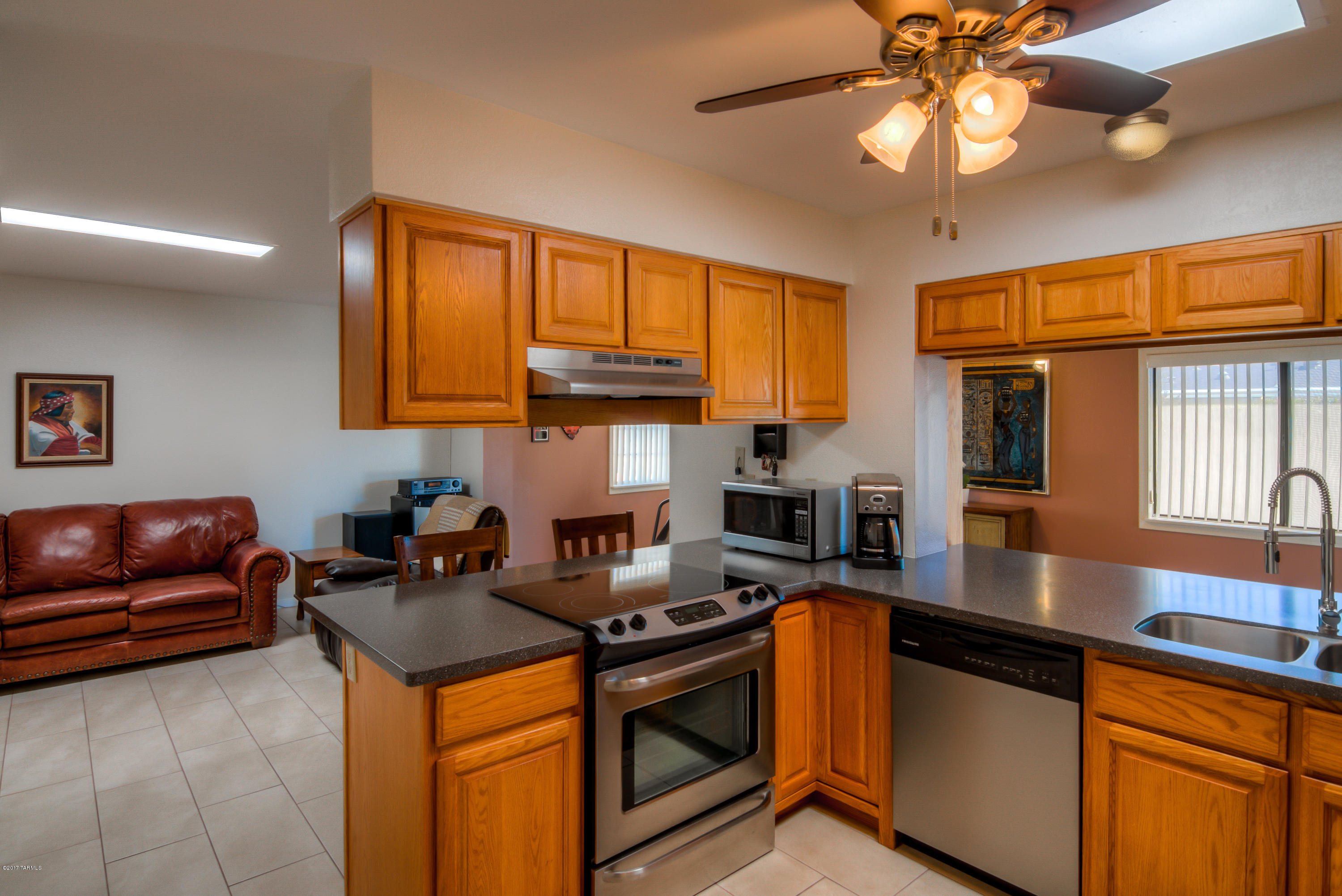 Need space for an RV or Desert toys? Like freedom from an HOA? Need a great kitchen with new appliances? Then this is the home for you! Featuring Corian counter tops, plank tile flooring throughout, updated bathrooms, immaculate pool and covered porch and tons of extra storage, this home is move in ready. Located in Marana with easy access to I-10, shopping and great schools, this home will go quick so make it yours!