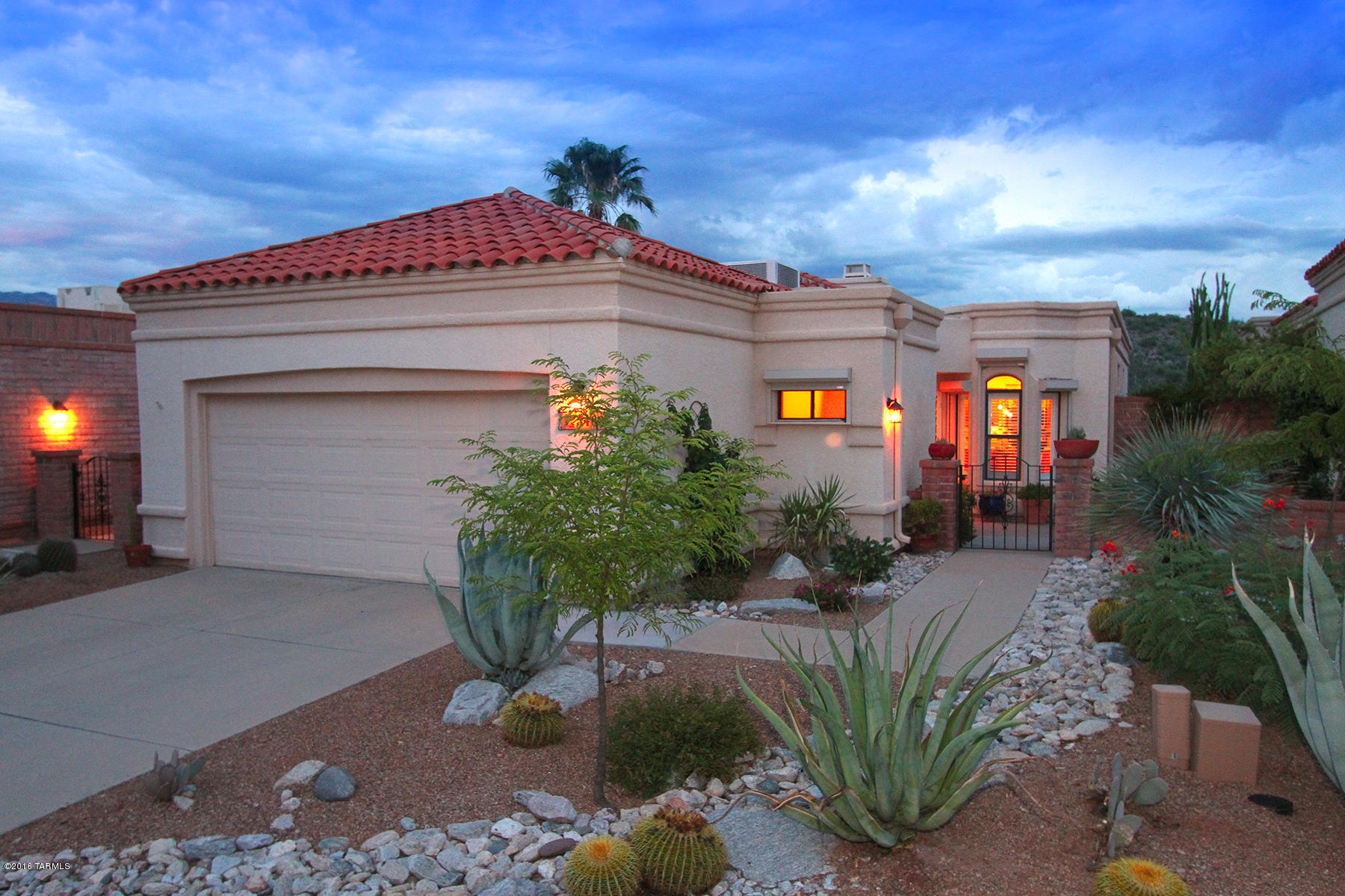 BEAUTIFUL FAIRFIELD HOME IN SUNRISE PRESIDIO OFFERING 2 BEDROOMS/2 BATHROOMS + OFFICE + SUNROOM WITH CAPTIVATING SANTA CATALINA MOUNTAIN VIEWS! THIS LIGHT & BRIGHT HOME HAS TOP OF THE LINE UPGRADES INCLUDING PLANTATION SHUTTERS, ROLLING SHUTTERS, CONTEMPORARY LIGHT FIXTURES, DOUBLE SIDED FIREPLACE, 24'' TILE SET ON THE DIAGONAL - AND MORE! SPACIOUS KITCHEN HAS STAINLESS STEEL APPLIANCES, CORIAN COUNTER TOPS AND COZY BREAKFAST NOOK. THE MASTER BEDROOM SUITE HAS A LUXURIOUS BATH WITH NEWER CABINETRY & FIXTURES, DUAL CLOSETS & GORGEOUS SLATE SHOWER. OFFICE COULD BE USED AS A SITTING ROOM OR DEN. VERSATILE FLOOR PLAN ALLOWS FOR ROOMS TO BE ADJOINED OR SEPARATED WITH POCKET DOORS. CLOSE TO COMMUNITY POOL, TENNIS COURT, SHOPPING & RESTAURANTS. WELCOME HOME!