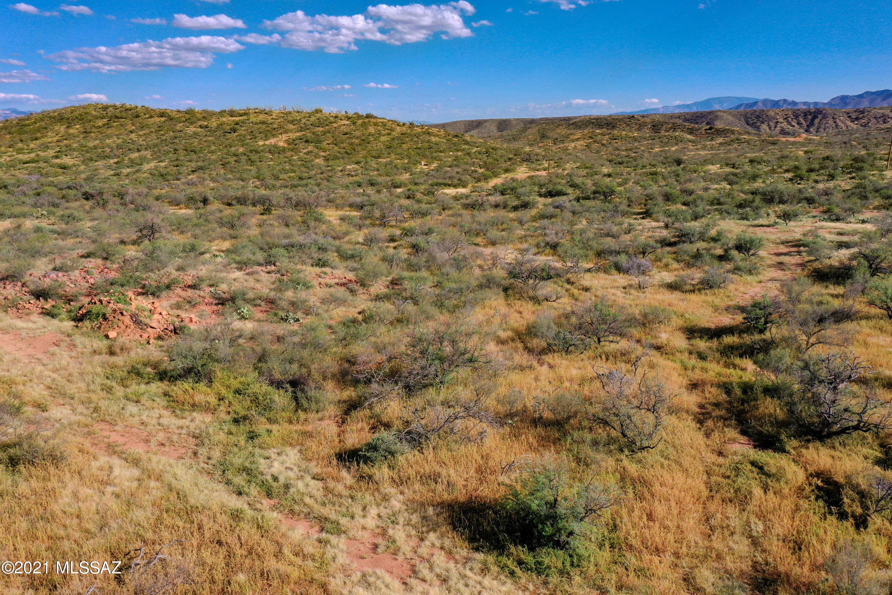 Owner will carry on this easy to build on and develop 2.5 acres. Great well with only 4 well shares! FHA/VA/USDA MH/Land package will qualify with this property.  Amazing quiet and secluded parcel with views in all directions.  Site built or Manufactured Homes! Come build your dream home at 4500' and enjoy the cooler temperatures.