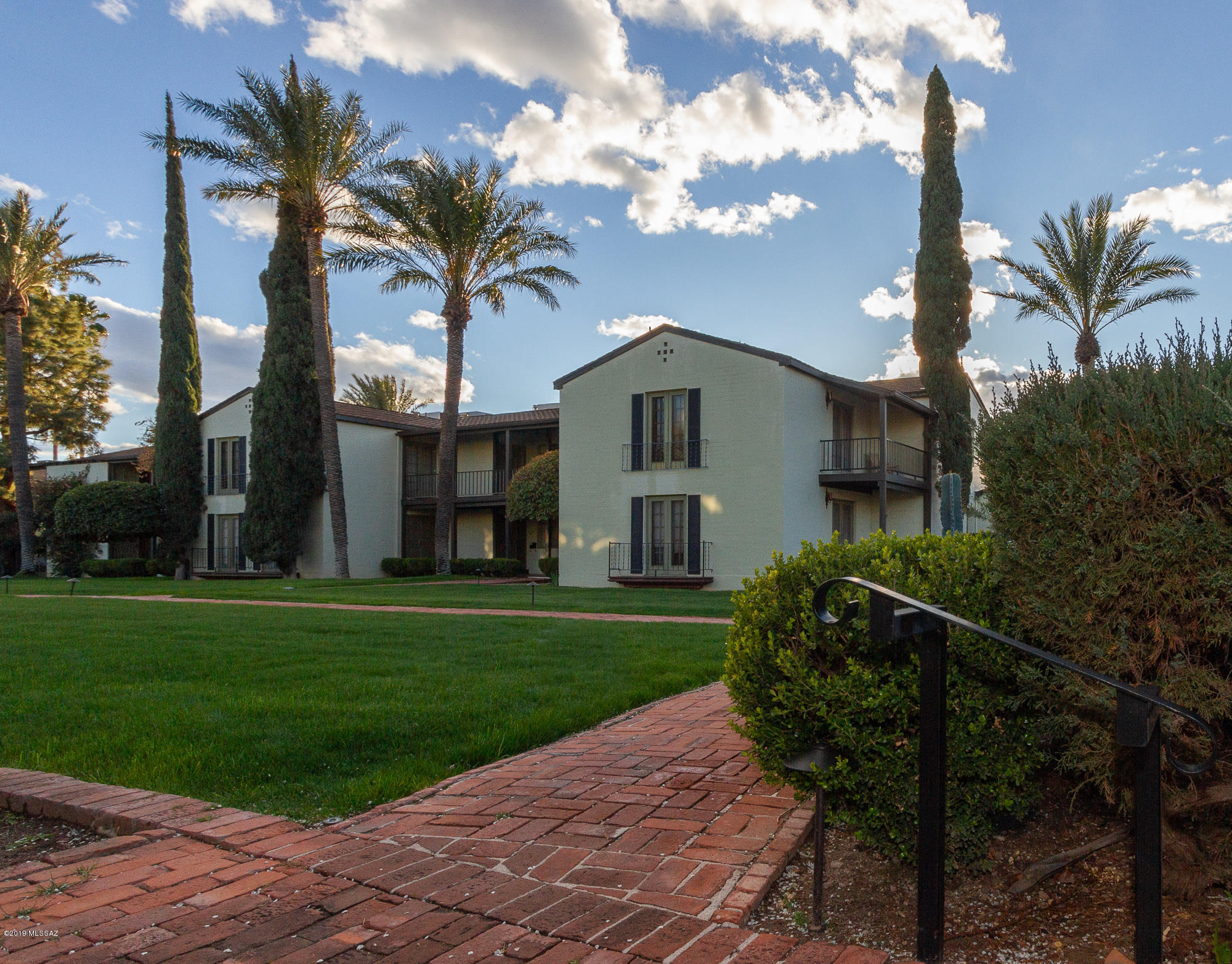 Very cool and unique property awaiting your upgrades. UofA location. Historic El Encanto Apartments Sam Hughes. Private 2nd floor unit. Professionally measured floor plan 1,237sf. Many original features. Mid-town serenity with front and rear (screened) private patios. The HOA covers garbage, exterior pest control, maintains the grounds, pool, roof, building exterior, common area utilities, water/sewer & laundry facilities. 2 pets are allowed. Exceptional for your Child/Grandchild UofA Student, your winter home or year round paradise within walking/biking distance to to local shops and restaurants. Rental quotas are full with wait list.