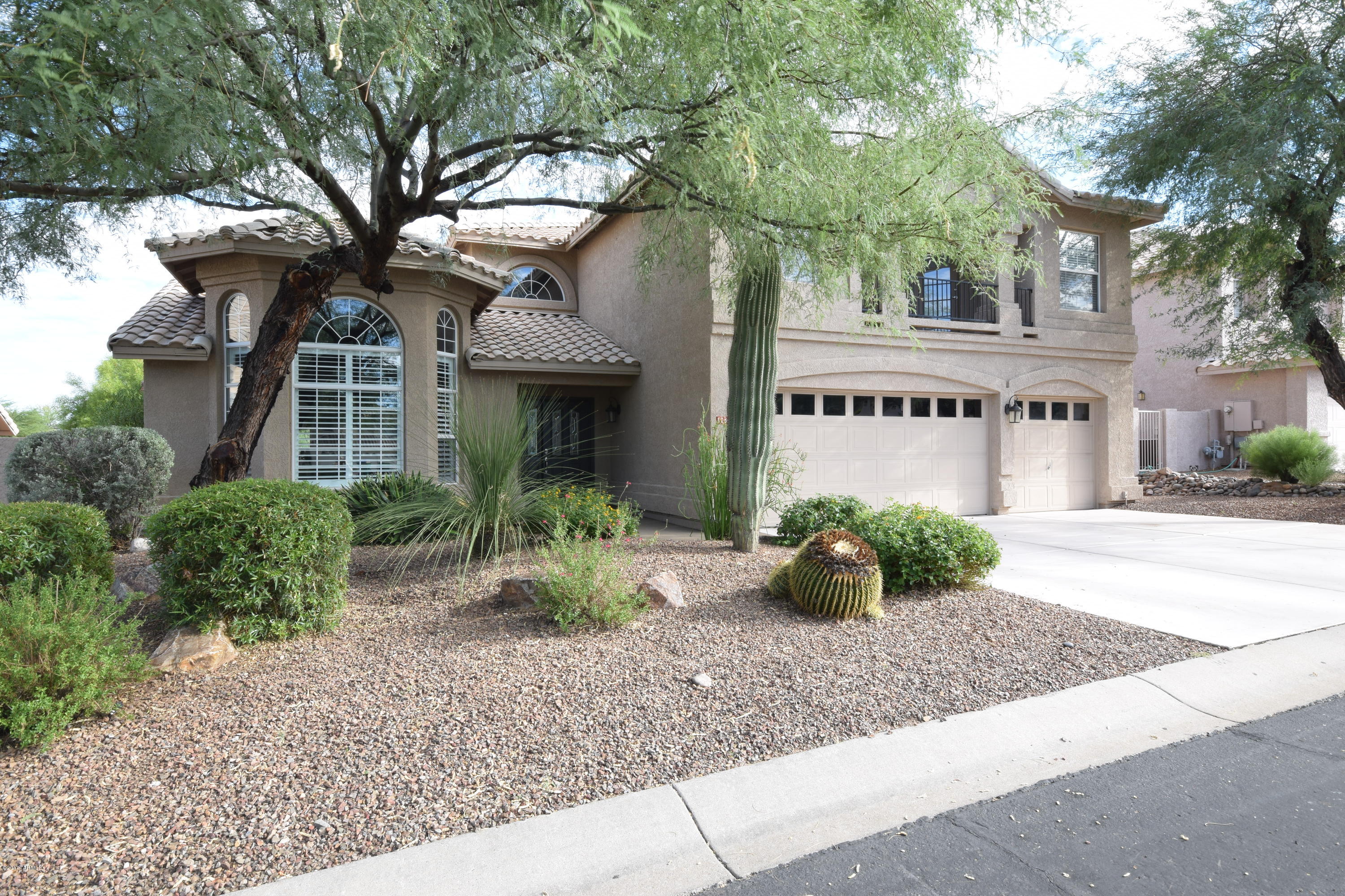 Welcome Home! Enjoy stunning fairway and mountain views from your beautiful home situated in the heart of Oro Valley! Over 3,500 spacious square feet with 5 bedrooms, 3 full baths, 3 car garage, abundant storage, and 2 balconies... 1 front & 1 back. Huge Master suite featuring His and Hers walk-in closets! Kitchen enjoys granite island and all new Stainless appliances since 2014. Gorgeous swimming pool and spa with spectacular rock waterfall feature! This wonderful family home offers tremendous value for this price point in Oro Valley.  Come... explore...and make it your own!  
    Walk or bicycle to OV Recreation Center, shopping, and/or multiple dining opportunities. Owner/Agent.