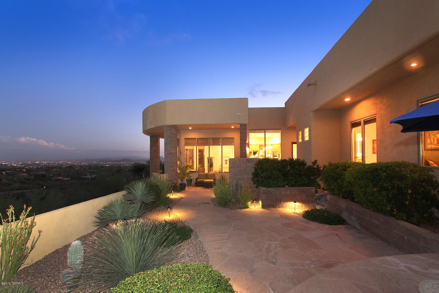 EXQUISITE CONTEMPORARY CUSTOM HOME ON A PREMIUM RIDGE LOT ON SUNSET CANYON IN GATED SIN VACAS. DISTRICT 16 SCHOOLS. ARCHITECTURALLY STUNNING HOME W/STONE ACCENTS INSIDE&OUT,TRAVERTINE STONE FLOORS,FORMAL LIVING RM LARGE PICTURE WINDOW&CITY LIGHTS,FIREPLACE,FORMAL DINING RM.KITCHEN IS SPACIOUS W/EXPANSIVE EAT-IN AREA, ISLAND,NEW GRANITE COUNTERTOPS, PORCELAIN BACK SPLASH,NEW GE STAINLESS STEEL APPLIANCES.LARGE FAMILY RM W/WALLS OF WINDOWS,CITY LIGHT&MOUNTAIN VIEWS TO MEXICO.4 BEDROOMS PLUS STUDY/WORKOUT ROOM/NURSERY,4 BATHS. MASTER BDRM IS SPACIOUS W/PORCELAIN TILE FLOORS, HIS/HER CLOSETS, LUXURIOUS MASTER BATH W/STACKED STONE WALLS,GRANITE COUNTERTOPS W/DOUBLE SINKS, WALK-IN SHOWER,GARDEN TUB&SEPARATE PATIO.KIDS STUDY AREA/DESK,ON-SUITE BATH FOR GUEST
RM.FLAGSTONE PATIOS,MANY SEATING AREA
