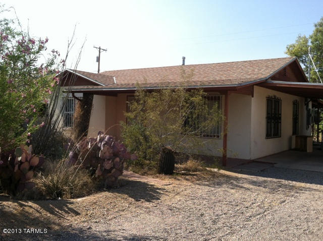 This charming home is perfect for anyone, with its central based location you’ll be close to all the amenities. This home features tile flooring throughout the main living areas with carpet in the bedrooms, making clean up a snap. The enclosed back yard is great for relaxing on cooler nights and the front yard features beautiful desert landscape. The refrigerator, washer, and dryer are included with this home. This home can be rented for 12 months or longer.