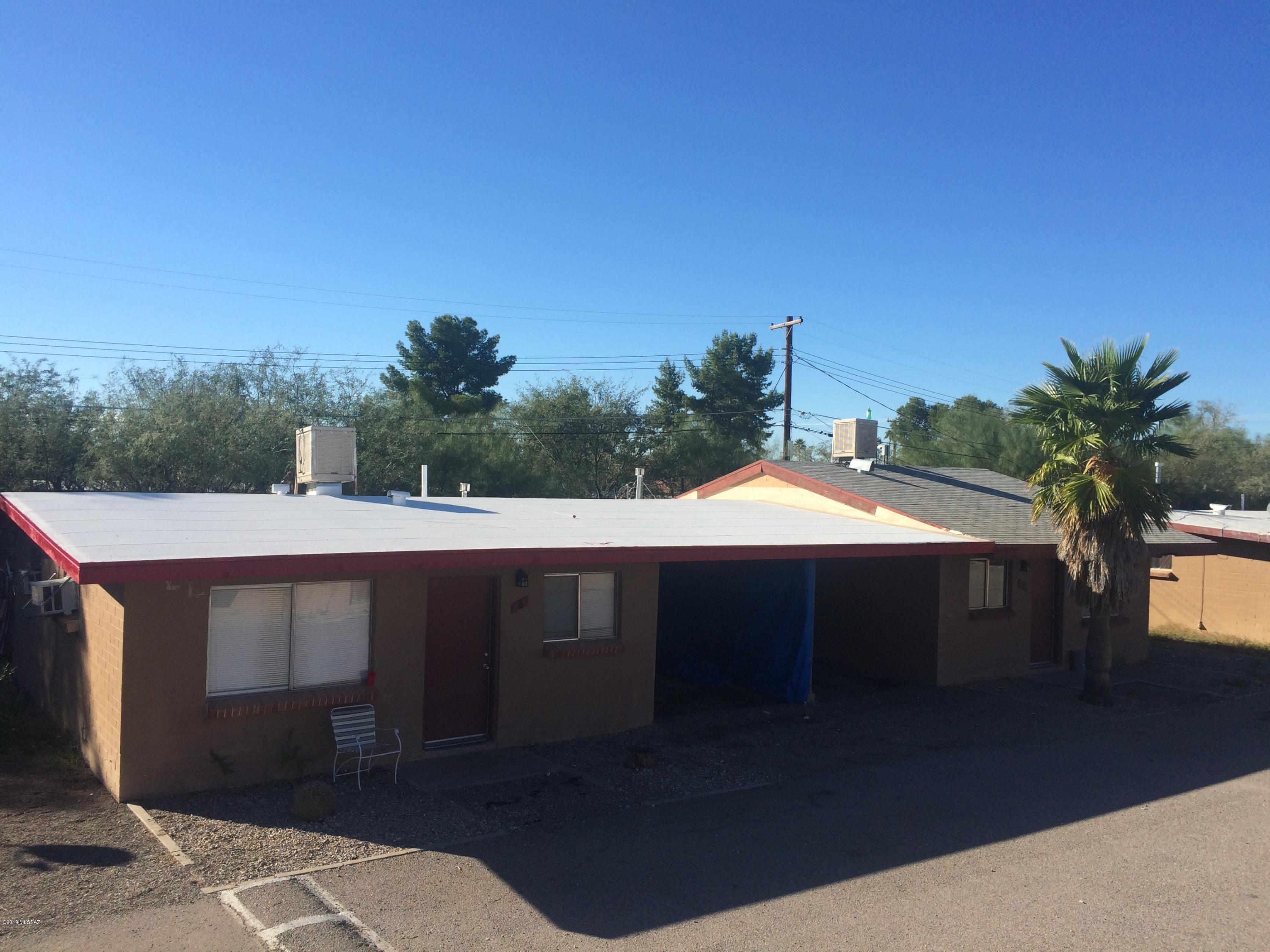 Large property with 26 duplex units and a 3 bedroom house.  All duplex units have carports, fenced yards, and storage shed with washer dryer hoookups.  Units are separated by the carports and do not have adjoining walls.  Many long term tenants.  Room to raise rents.  Tenants pay gas and electricity, owner pys water trash and sewer.  Plenty of parking.  All units have swamp coolers and gas wall heaters.  Listing agent related to seller.