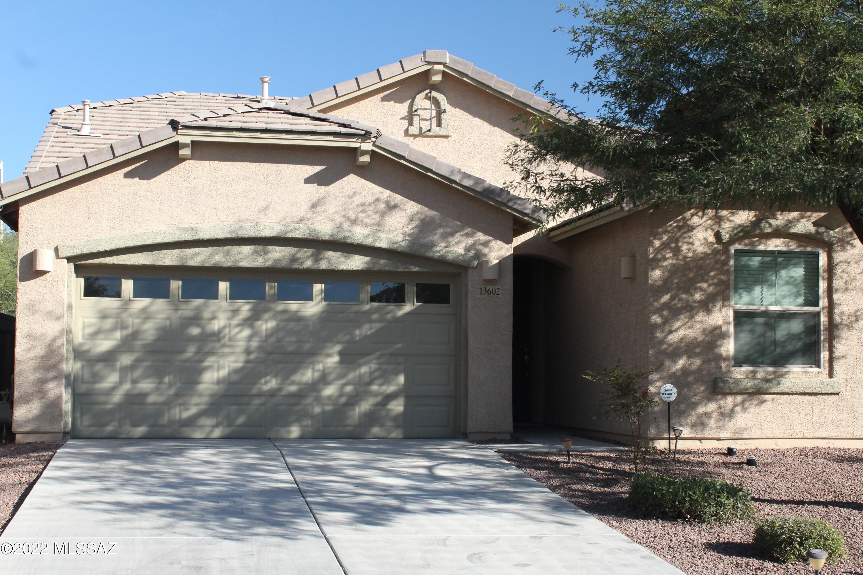 This is your chance to be in your new home by Christmas!  You will fall in love with this Move-in-ready Lennar home built in 2016. It is appointed with upgraded features such rectangular ceramic tile, granite countertops and a double oven with gas range. This home features 4 bedrooms and 3 full baths. The primary bedroom has a walk in closet and its own access to the backyard. This was Lennar's bunkhouse model which includes an oversized bedroom that could be used as a bonus room, game room, or whatever your heart desires. You will enjoy the privacy and the low maintenance that the backyard offers. Attractive covered paver patio, turf and a flower bed provide a splash of color and the perfect setting for backyard fun. Come make it your own!