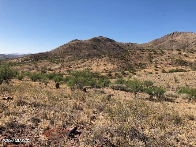 Build your custom dream home on this one-of-a-kind property next to the historic Salero Mine Ghost Town. This is 1 of 2 gorgeous parcels in Salero Ranch being offered by the same owner, each adjoining the ghost town. This 37 acre lot has a raised building site that offers absolutely stunning panoramic mountain views that go on forever, while giving a nod to the past in the ghost town below. Truly a must-see. Salero Ranch is a gated community with large lots ensuring plenty of privacy to get away from it all. Underground electric is available at the property line. Lots of opportunities for hiking, mountain biking and horseback riding. Build now or invest in your future with low taxes and HOA fees. No subdividing.
