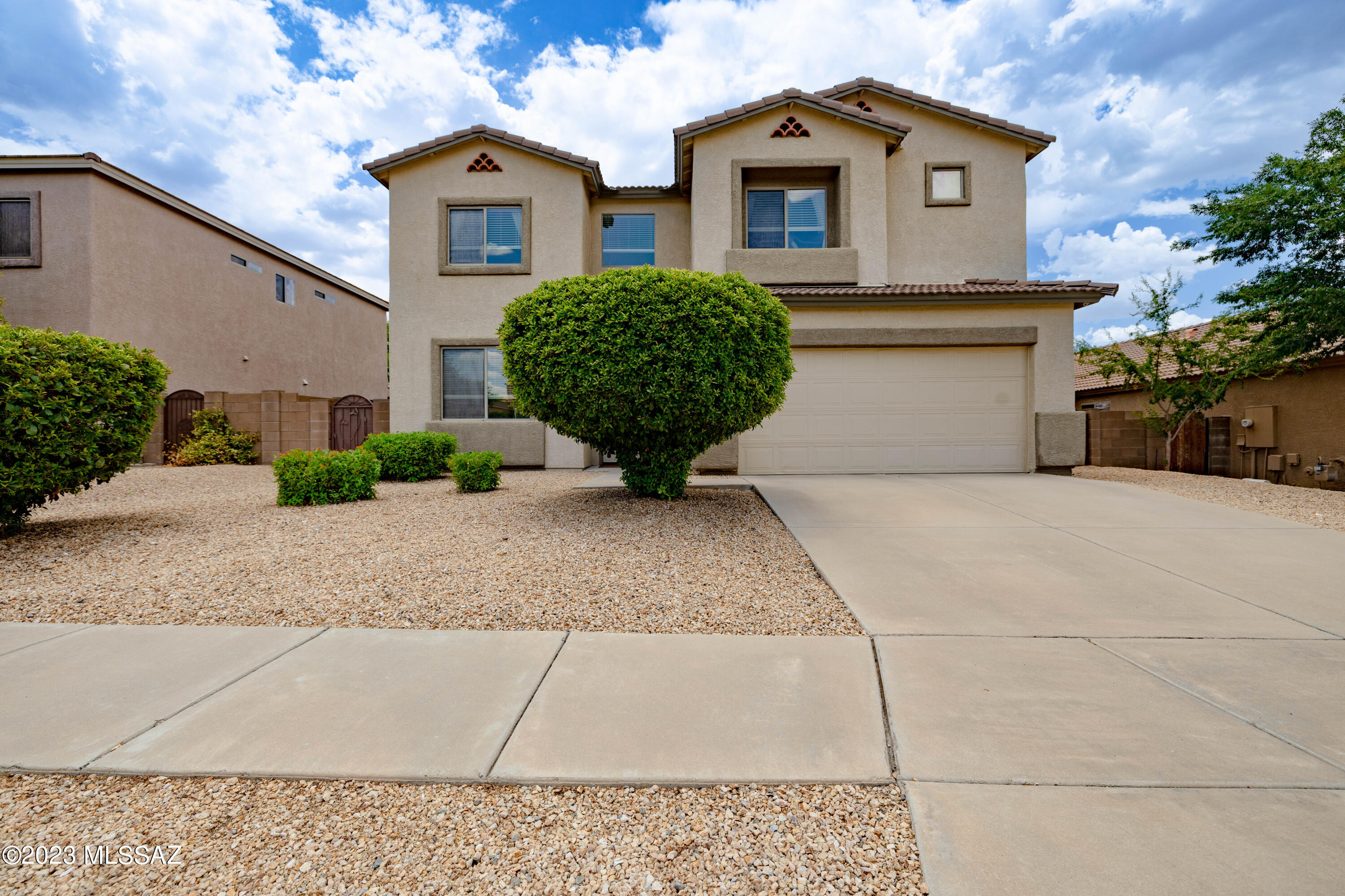 This immaculately maintained 2,422sqft ,4 bed/3.5 bath has it all. Located at the base of the Rincon Mountains in the coveted Vail School District, this home is turnkey move-in ready! Fully finished 3 car tandem garage, bright and open spaces throughout, large loft w/ custom secluded primary suite, large bathroom and walk-in closet, and many large windows to enjoy the beautiful views. Fresh paint, all appliances convey, Ring security system & camera's. Professionally decorated and landscaped yard, fully irrigated w/ extended patio, stamped concrete, natural desert that backs up to a large natural preserve.