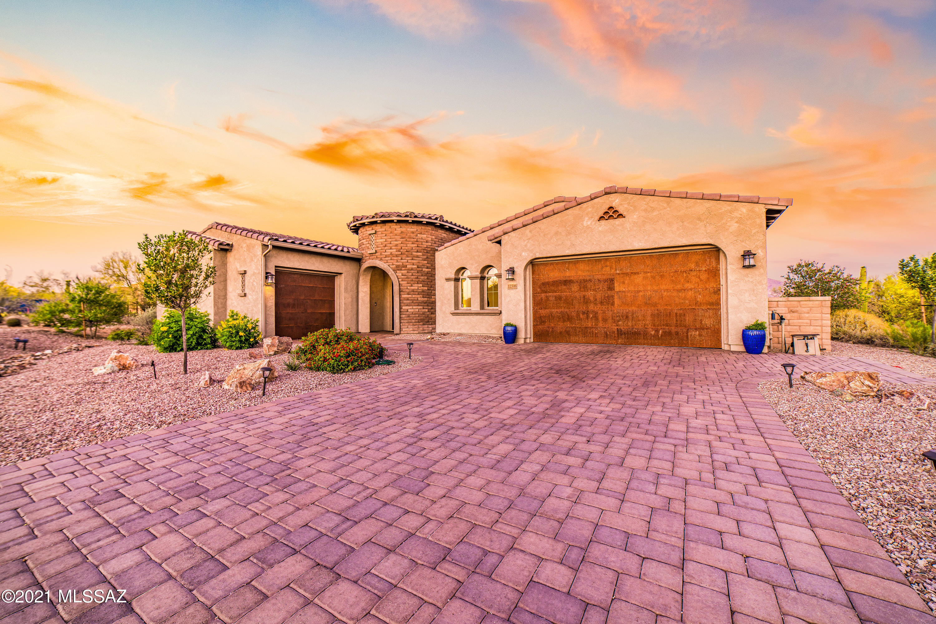 As you walk through the custom wrought iron front door, you will be greeted by this luxurious home, complimented by an open floor plan with elegant, high end finishes. You will love cooking in your beautiful chef's kitchen which opens up your spacious living - perfect for entertaining or a weekend at home with the family.  

Step outside to your oasis backyard and enjoy your pool and spa while taking in your unobstructed mountain views from your 3/4 + acre property. Stay a while and lounge underneath your ramada while watching the mountains change colors with our beautiful desert sunsets. Stay a little longer and cook dinner on the outdoor BBQ, perfect for those cooler summer nights. Take advantage of the space the home offers with your split bedroom floorpan and retreat to your master suite, outfitted with dual walk in closets and a spacious, private bathroom. 

Your exquisitely kept 4 car garage offers plenty of space for your cars, toys, extra storage of whatever your heart desires.  Comes see what makes this home so special, and make it yours!