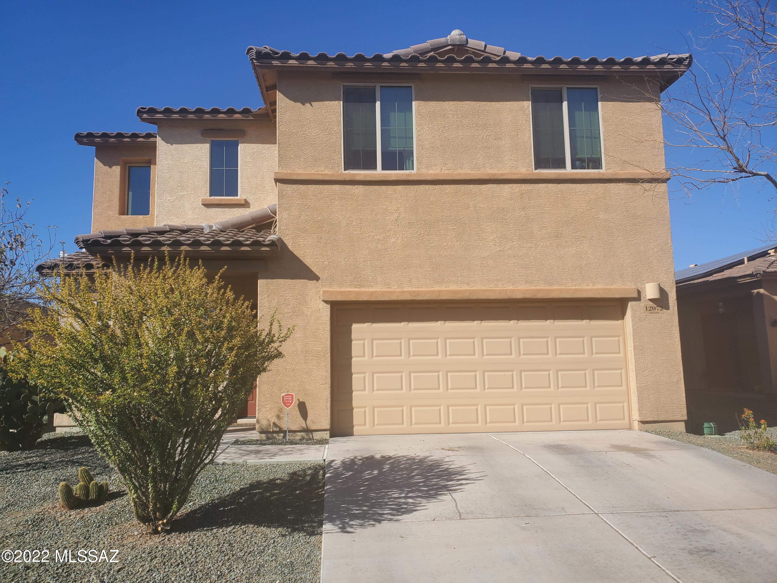 Beautiful 2 story home in desirable Marana community . Perfect entertaining area down stairs right off the kitchen and a extra large back yard! Granite countertops along with additional Loft area upstairs! Washer, dryer and fridge included in sale! Ready for you to move in. Come see today!