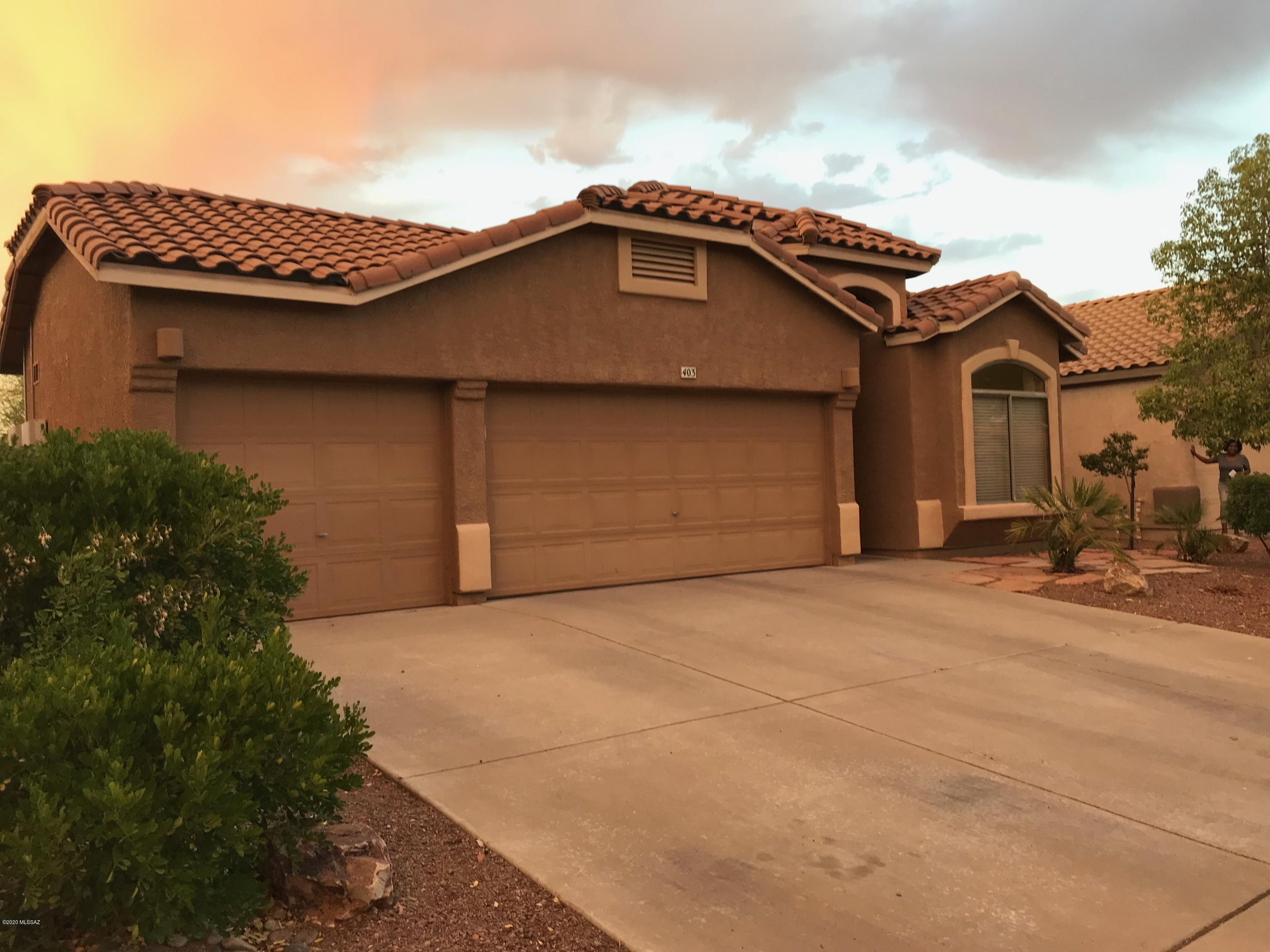This 4 Br 2 bth in Rancho Sahuarita is a pride of ownership GEM. Nestled in the heart of the SW this lovely place has many upgrades and new features. With Money saving solar already installed, the 3 car garage and brand new black  appliances. This property is a Real Value. Split sinks/master, thousands of $$$ in custom landscape and flagstone patio and pavers, dura-painted garage floor and custom cabinets in garage. Pantry in Kitchen, Laundry off Kitchen, kitchen off garage entry, such a nice flow and floor plan. everything is in great condition. Amenities galore, swimming pools, tennis courts, basketball, water slides, splash pond, kids pool, fishing lake, complete gym, exercises classes, special community events, concerts and so much more. Close to shopping and service's, fresh paint.