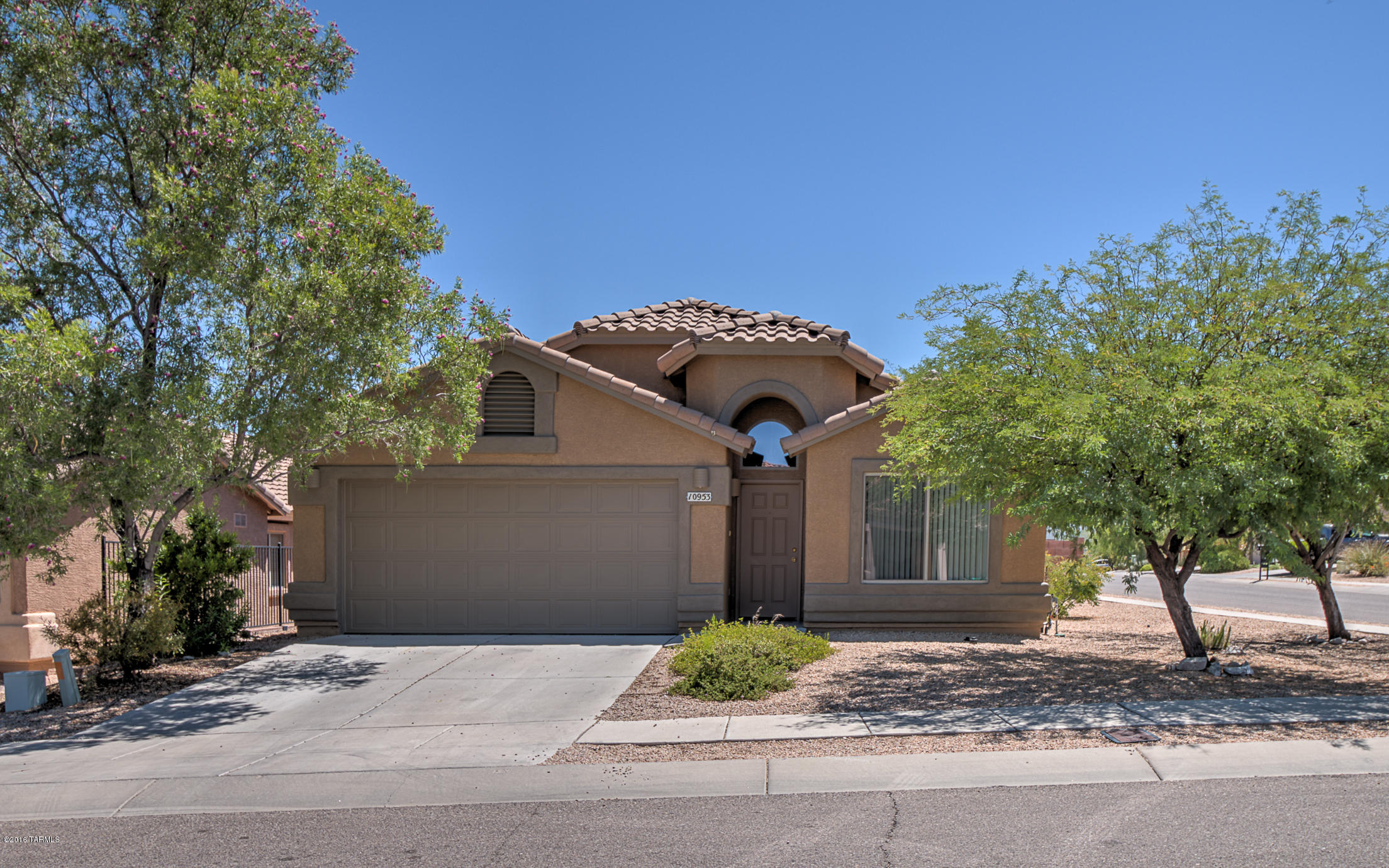 Exceptional value in an established neighborhood. This charming 4BR/2BA contemporary has been freshly painted inside and out. A living/dining area plus separate GR lets you spread out. Eat-in kitchen provides good counter and cabinet space including an island w/ breakfast bar. Bedrooms are split 2 to a side with connecting Jack n ’Jill bath. There’s plenty of storage and a pretty back yard with shade trees and a covered porch. Convenient to schools and just 4 miles from shopping, this is one that won’t last long!