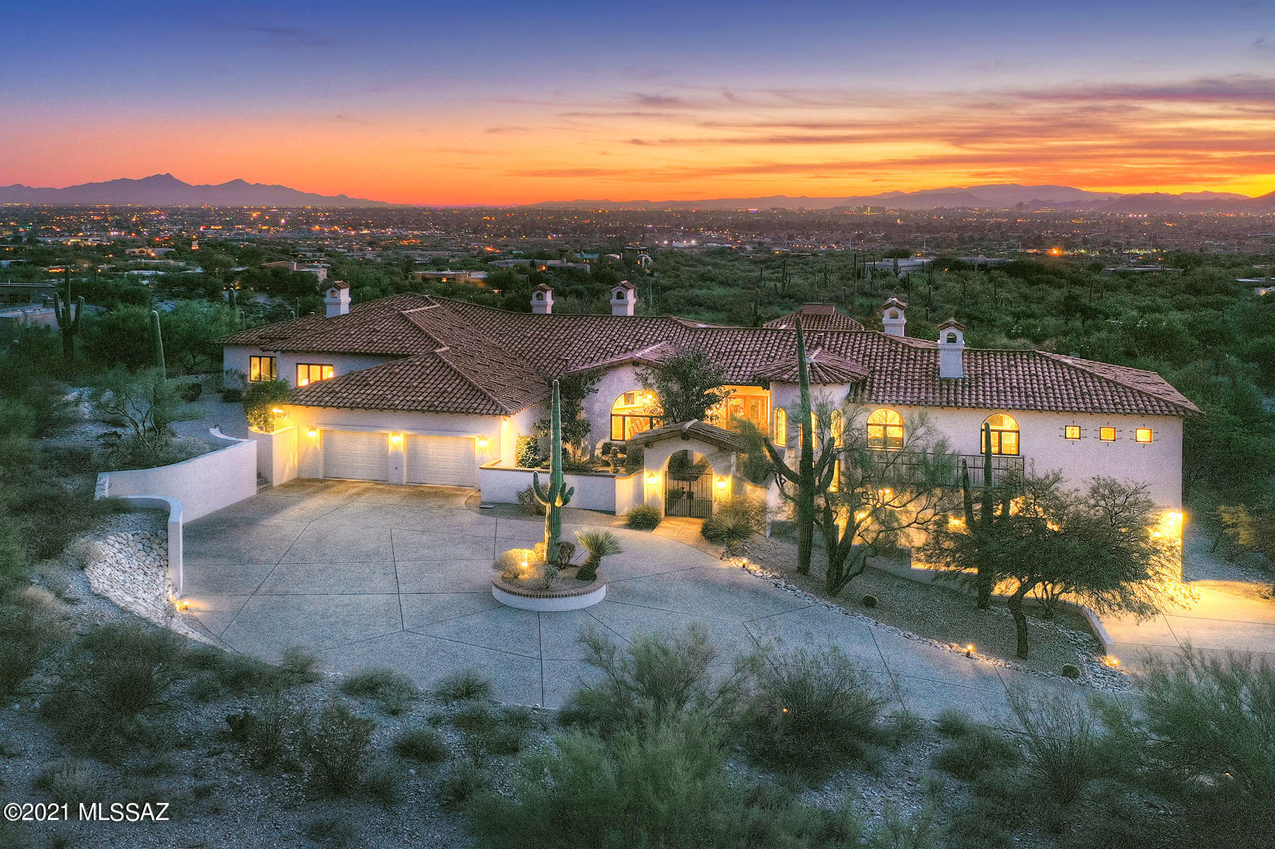 SOPHISTICATED & GRACIOUS SANTA BARBARA STYLE ON 2.3 ACRES ON TOP OF A RIDGE W/360° VIEWS IN PRESTIGIOUS GATED FOOTHILLS COMMUNITY OF LA PUERTA. COURTYARD W/WROUGHT IRON GATES & CANTERRA STONE FOUNTAIN,GALLERY FOYER W/CHARMING LIBRARY OR MUSIC RM W/FIREPLACE, LIVING RM W/HIGH CEILINGS,HAND CARVED CORBELS,DRAMATIC FIREPLACE,FORMAL DINING RM,WOOD FLRS,PELLA WOOD CASED WINDOWS,GOURMET ISLAND KIT,ALDER CABINETS,GRANITE COUNTER TOPS,GAS RANGE,TRAVERTINE FLRS,FIREPLACE,BKST AREA,FAMILY RM W/FIREPLACE,4 BR'S,6 BATHS, 6 FIREPLACES + EXEC STUDY+EXERCISE RM, MSTR SUITE W/SITTING AREA,FIREPLACE,LUX BATH,WALK-IN CLOSET,SEPARATE PATIO,FABULOUS BKYD W/GAS HEATED POOL,SPA,WATER FEATURE,GRASS,RAMADA,FIREPLACE,5 CAR GARAGE,DIST 16 SCHOOLS,CITY, MOUNTAIN & SUNSET VIEWS ! FLR PLN & DRONE VIDEO UNDER PHOTOS.