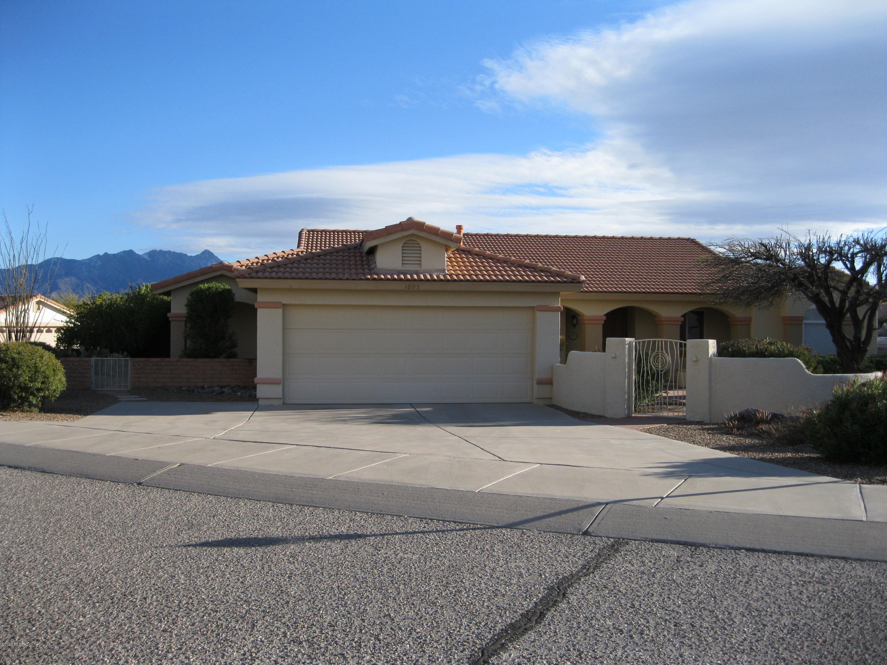 Situated on a large corner lot with beautiful mountain view.  Extra wide driveway makes guest parking easy. Den has double pocket doors and a closet and located by the front foyer.  One guest bedroom has a queen Murphy bed.  Kitchen has gas cooking and large breakfast nook so the dining area in the great room is currently being used as an additional seating area. Expanded master bedroom large enough for even a king bed and large bedroom furniture ensemble.  Interior painted in 2018.  New HVAC 2017.  Furnishings available by separate bill of sale.  Enjoy the Visual Tour but you will want to see this one in person.