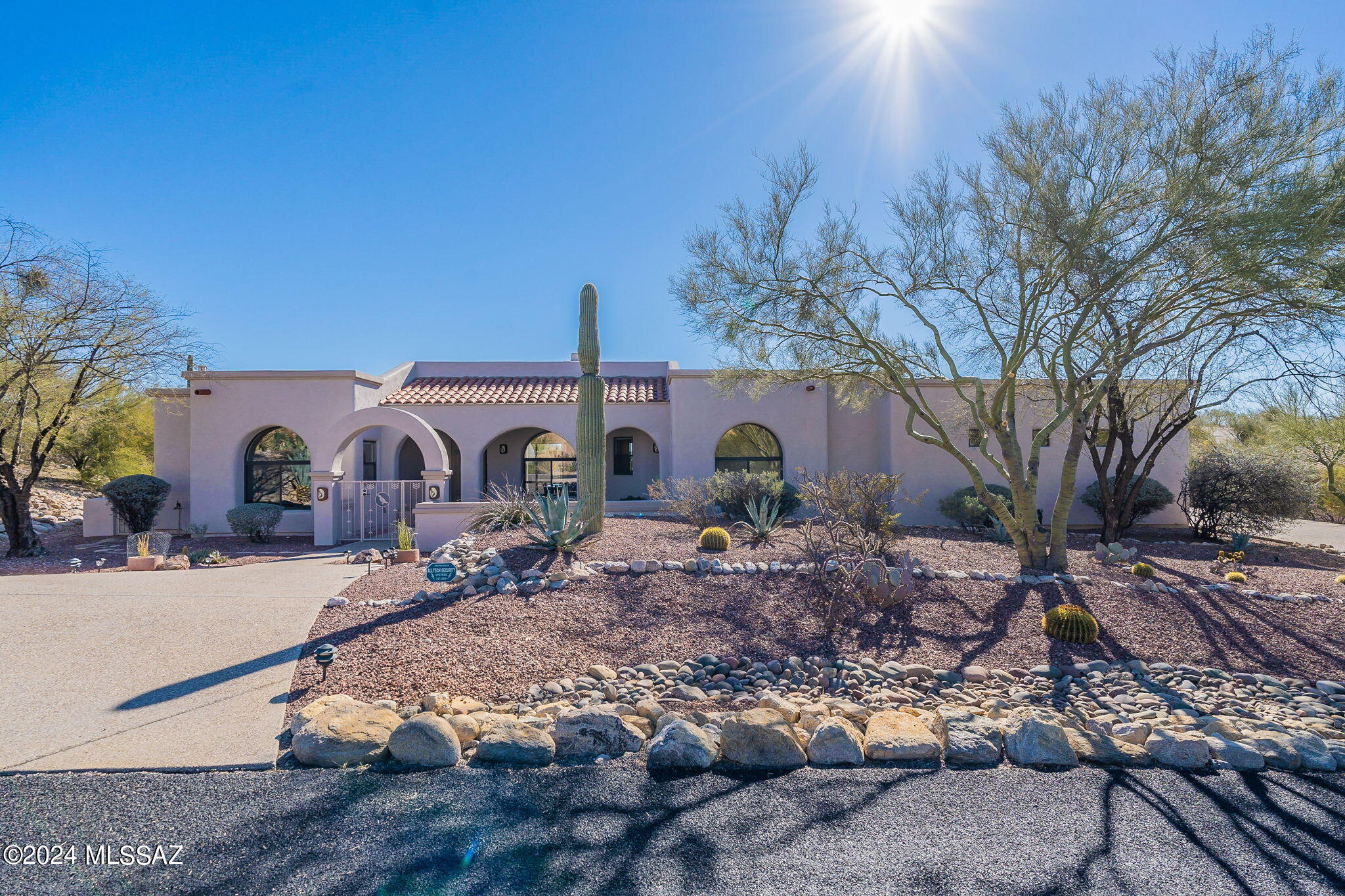 Welcome to this stunning dream home located in Bellas Catalinas Estates, nestled on an elevated premium lot that offers breathtaking views of the city lights, spectacular sunrise, sunset vistas, or even mountain views from the front patio area. This captivating property spans over 3031 sqft and features 4 bedrooms and 3 baths, making it perfect for a growing family or those seeking extra space. The residence was custom-built with timeless charm and durability in mind. Step outside to unwind and soak in the awe-inspiring surroundings. The low-maintenance yard provides a peaceful oasis for you to relax and enjoy, while the covered rear patio ensures your comfort during sunny afternoons. The property is conveniently located in Catalina Foothills, offering unparalleled beauty and tranquility. Don't miss the opportunity to make this exquisite property your forever home. Schedule a private viewing today and experience the enchantment and luxury it provides.