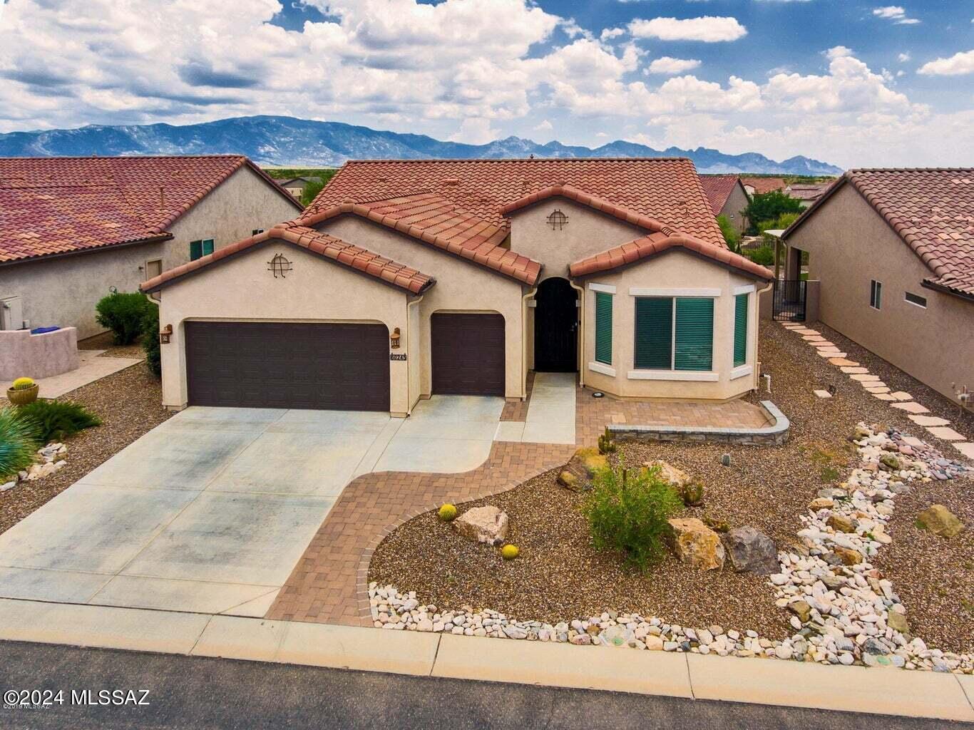 This unfurnished home is available to rent right now! This very popular Dolce model in Tucson's newest active adult community of Saddlebrooke Ranch. This nicely ugpraded home features new carpet and interior paint, a large master suite, an office/den, and an en-suite second bedroom for guests. Enjoy your morning coffee on the large front patio and relax in the evening on the back patio, with peak-a-boo mountain views. Enjoy all the amenities this active adult community has to offer including classes, fitness center, swimming pools, golf, pickleball, tennis and more! Tenant pays utilities, and owner pays HOA fees, landscaping, and property taxes. Please call/text property manager for more info and to schedule a viewing.