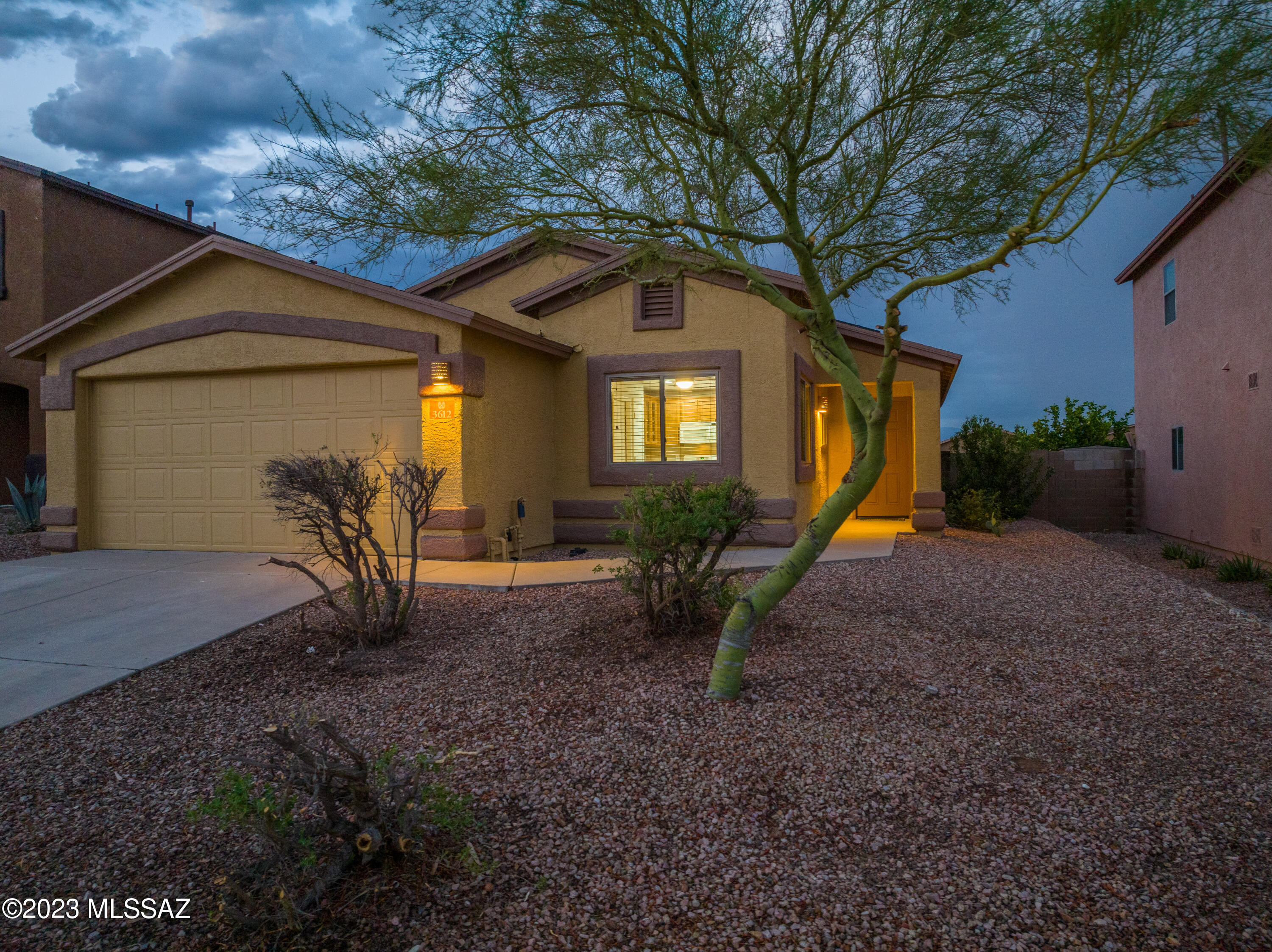 This home is gorgeous and  Super Energy Efficient with OWNED SOLAR and HIGH ENERGY EFFICIENT WINDOWS. Notice the fresh exterior paint, tile throughout and large kitchen with ample counter space, tons of cabinets/bar seating. The large family room is perfect for entertaining and will provide ample space for your family to enjoy. The home has three spacious bedrooms and two well maintained bathrooms. The backyard is very private with no homes directly behind. Enjoy gorgeous sunsets/mountain views and quiet nights star gazing. This home will not disappoint and will save you tons of money due to the solar and energy efficiency that this home boasts. Come see it before it is sold!