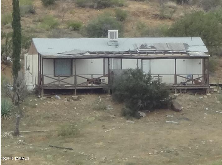 Distressed 3 bed/2 bath home on over 39 ACRES of LAND.  Property is highly damaged and may need to be torn down.