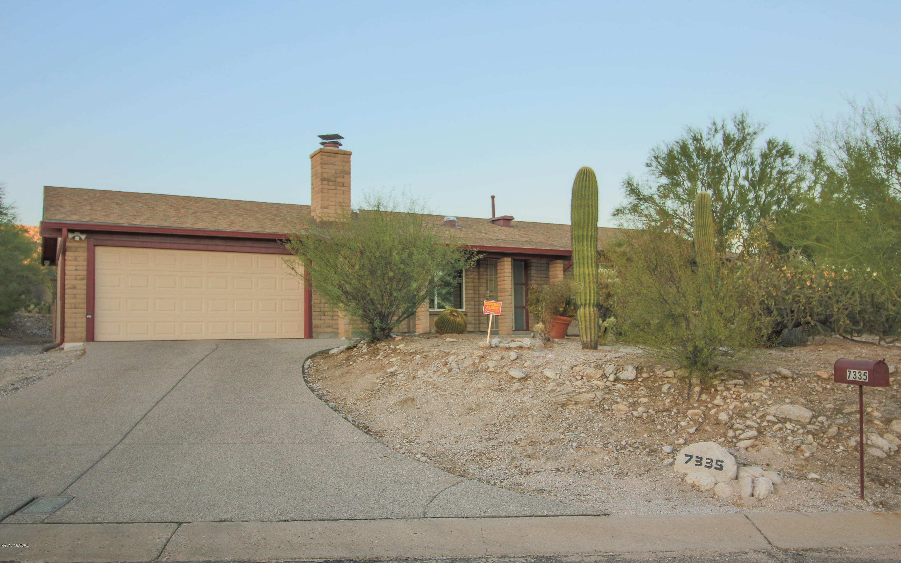 What a great location at a great price with lots of upgrades. This ranch style home features a nice open floor plan with cute kitchen, large heated and cooled AZ room, ceramic tile throughout, ceiling fans, beehive fireplace, cold AC, 4 solatubes for added natural lighting and more. The exterior features wonderful mountain and city lights/views, covered front entryway, nice sized workshop with 120v and 220v outlets, 2 car garage, two storage sheds, hot tub and much more. Come see this awesome home and call it yours!